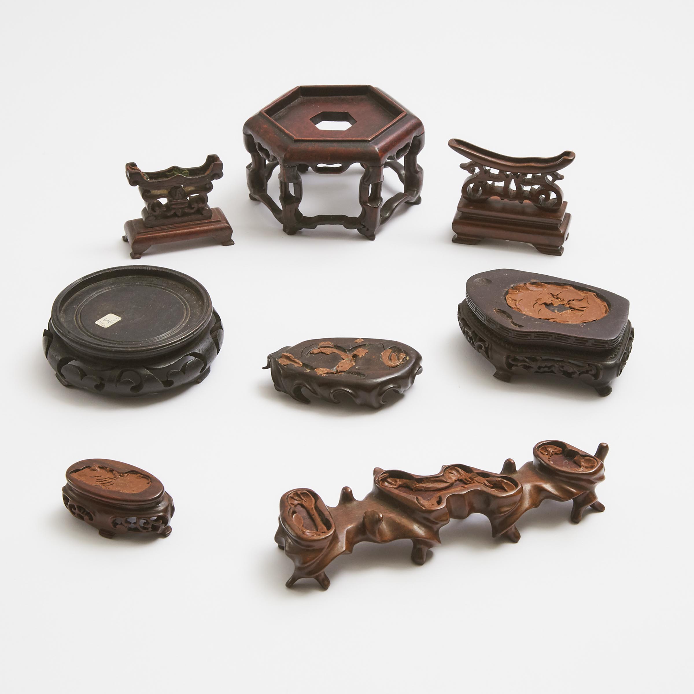 A Group of Eight Chinese Small Wood Stands