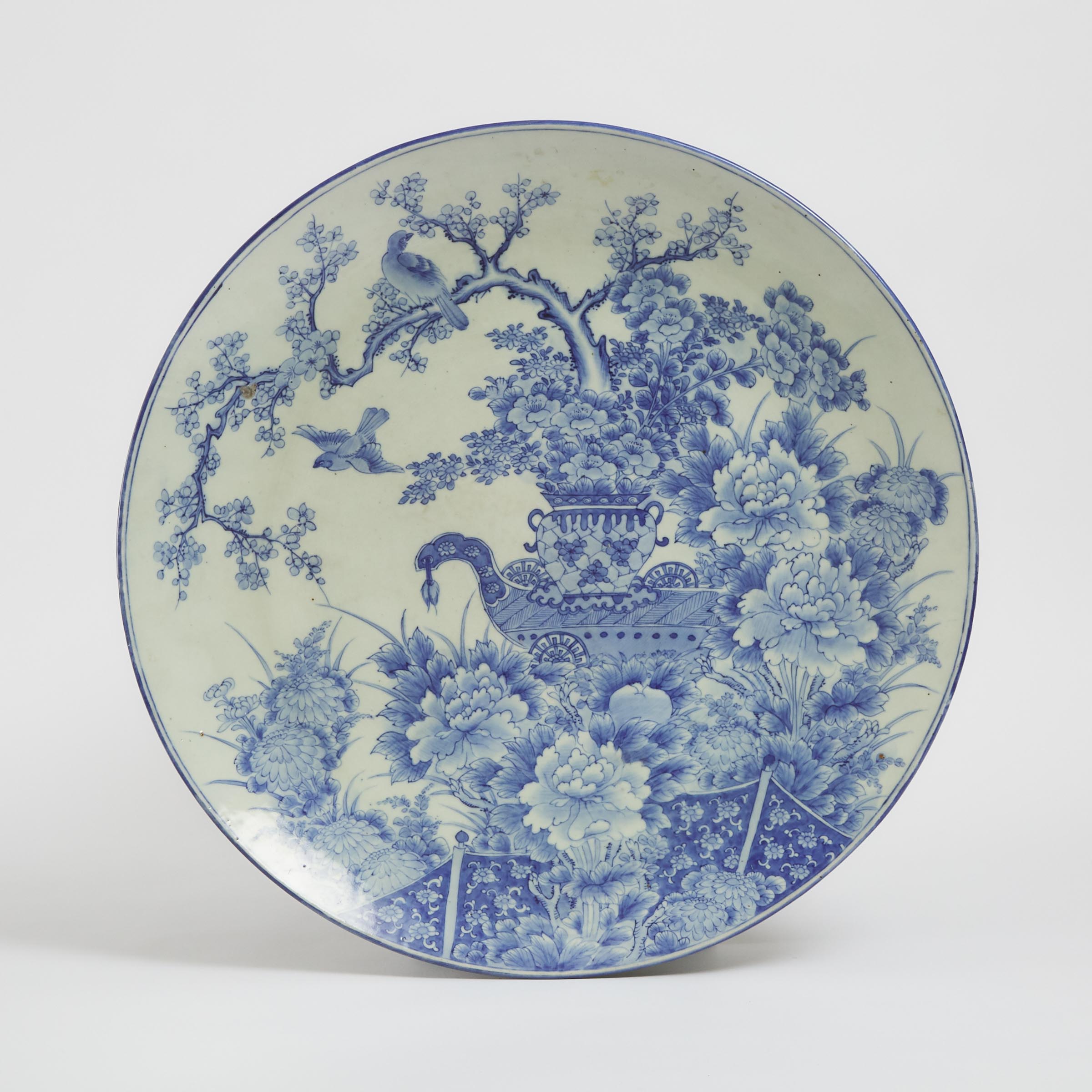 A Large Japanese Arita Blue and White Circular Charger, Meiji Period, 19th Century
