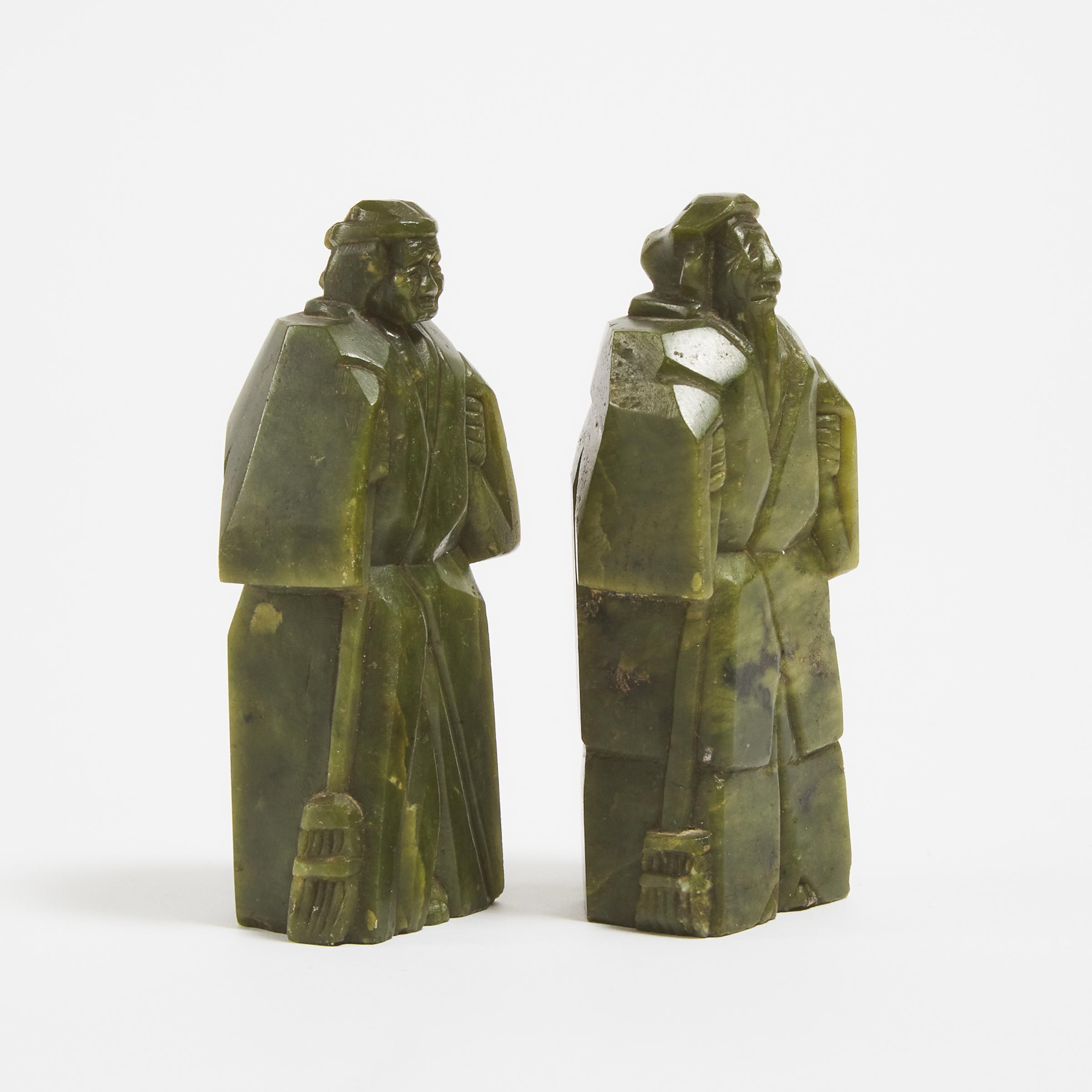 A Pair of Green Jade Figures of an Elderly Couple, Early 20th Century