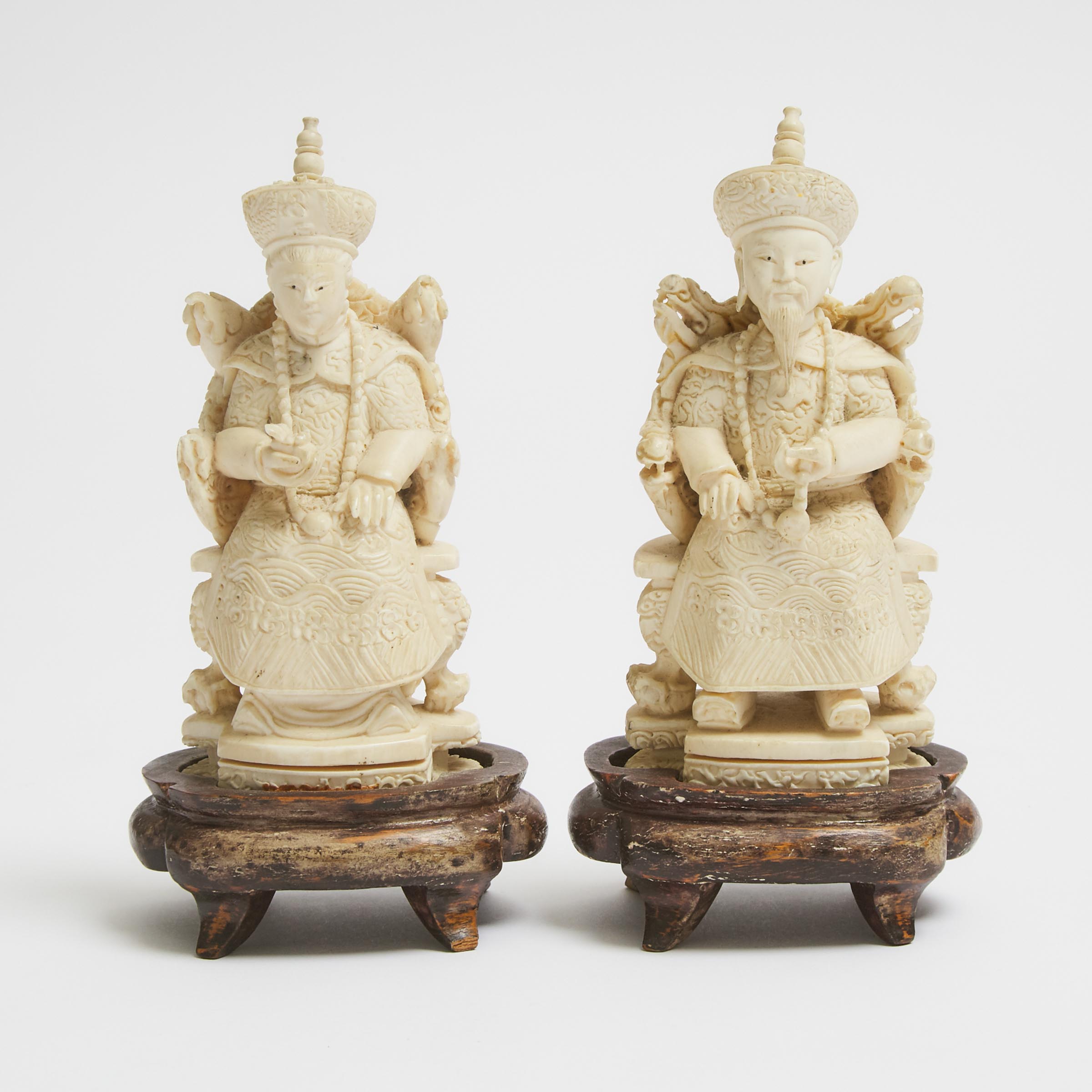 An Ivory Carved Emperor and Empress Pair, Early 20th Century