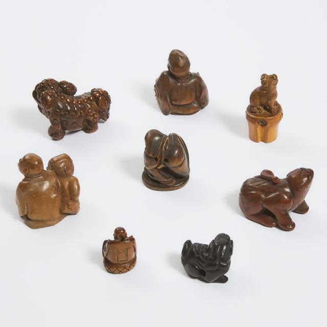 A Group of Eight Boxwood and Bamboo Netsuke and Carvings, 19th Century and Later