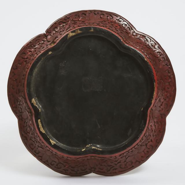 A Carved Cinnabar Lacquer Lobed Dish, Qing Dynasty, 19th Century
