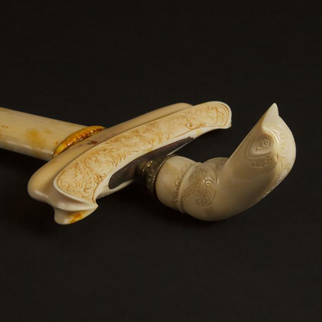 A Balinese Ivory Kris Dagger, Together With a Pair of Bone Carved Figures and a Pair of Soapstone Bookends