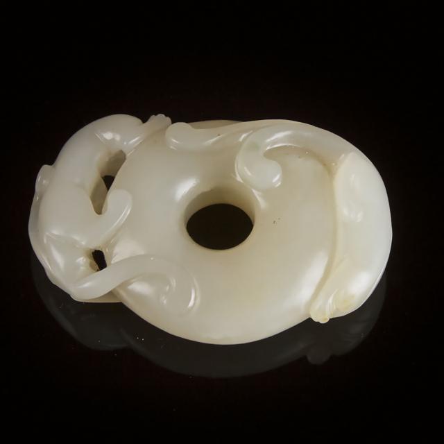 A White Jade 'Chi-Dragon' Circular Pendant, Late Qing Dynasty, 19th/20th Century