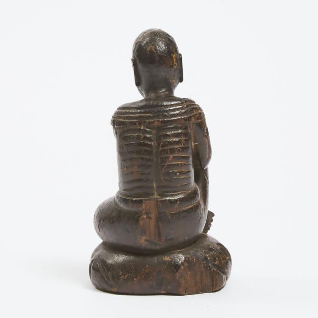 A Wood Carved Figure of a Luohan, 19th Century