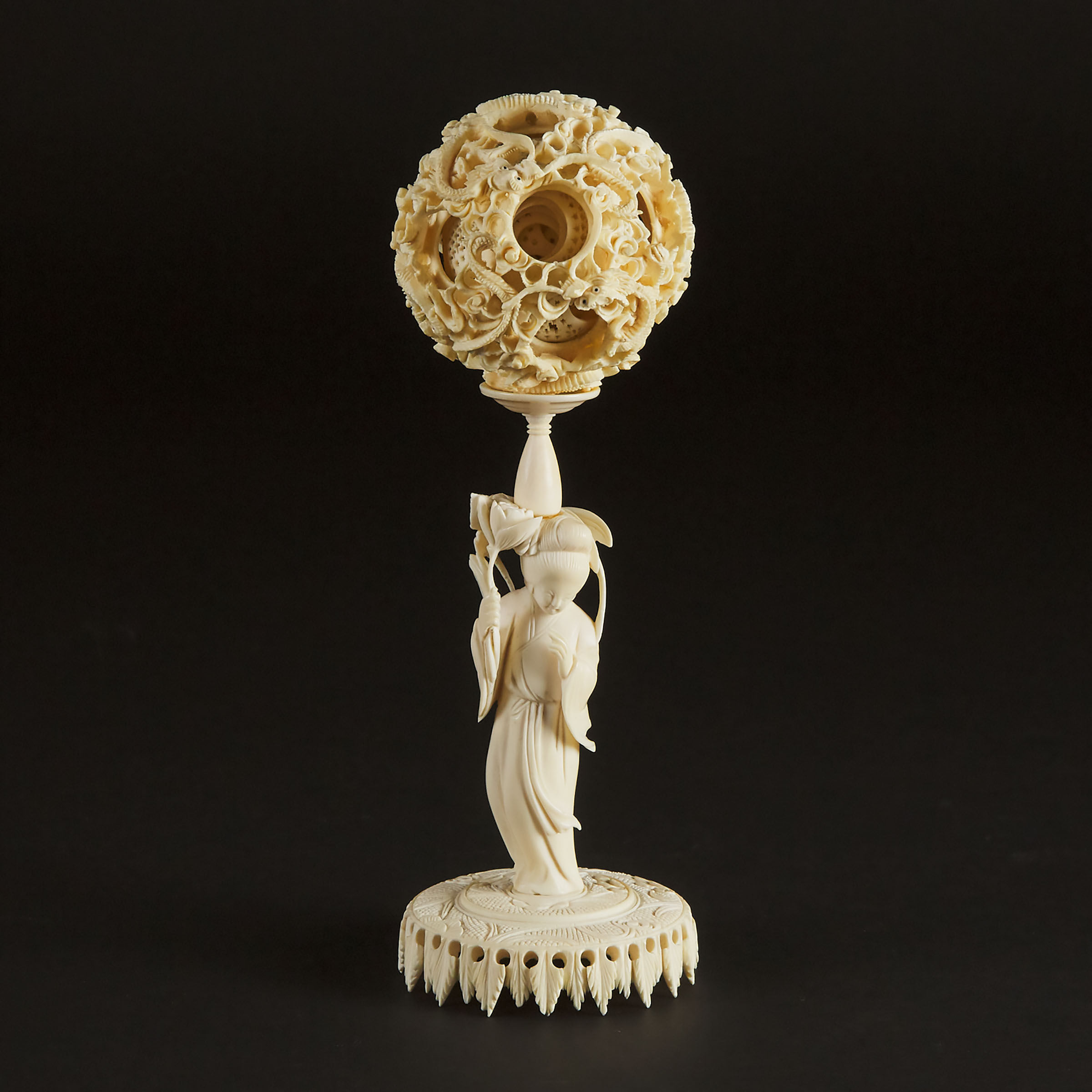 A Chinese Ivory Puzzle Ball and Stand, Circa 1900