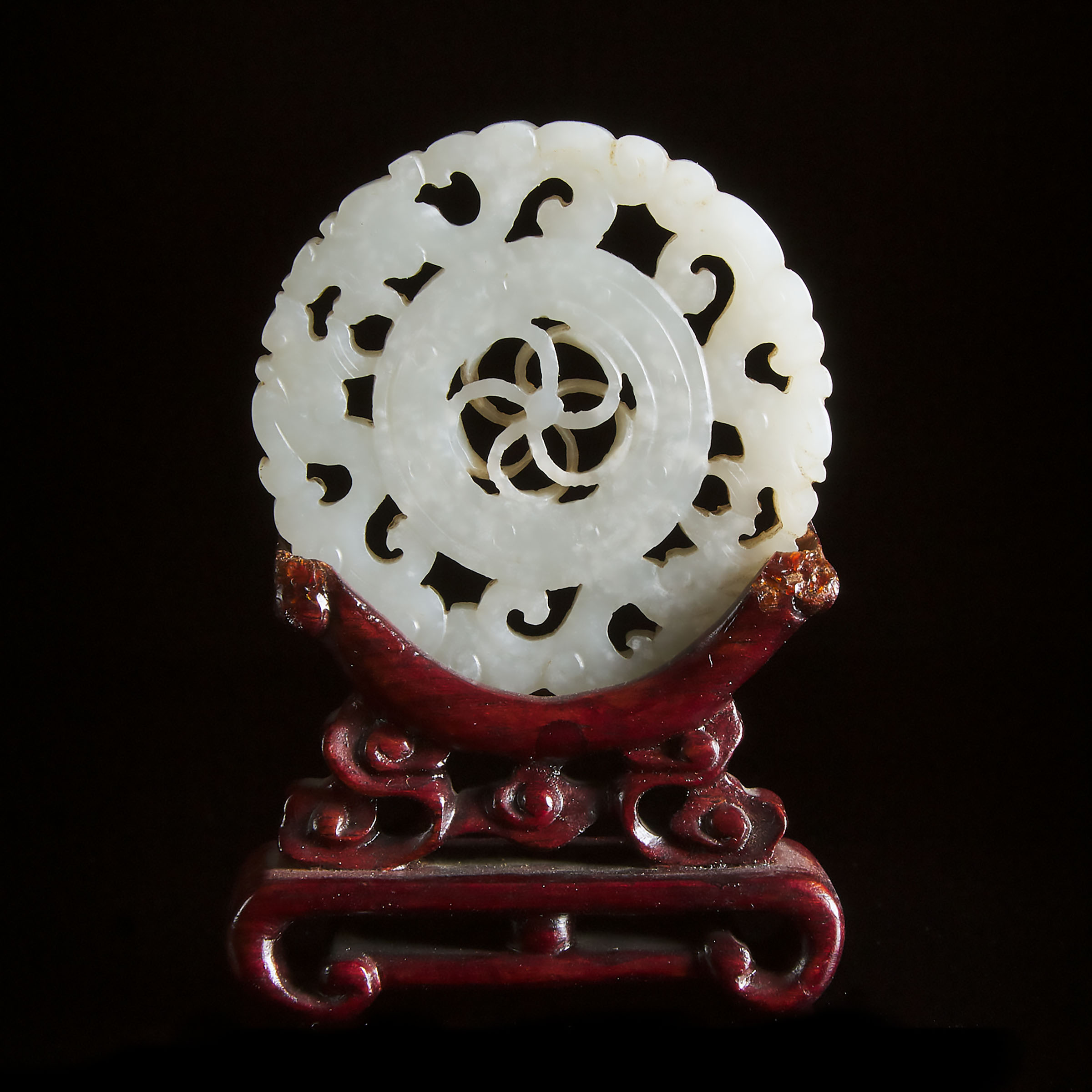 A White Jade Reticulated Circular Plaque, Qing Dynasty