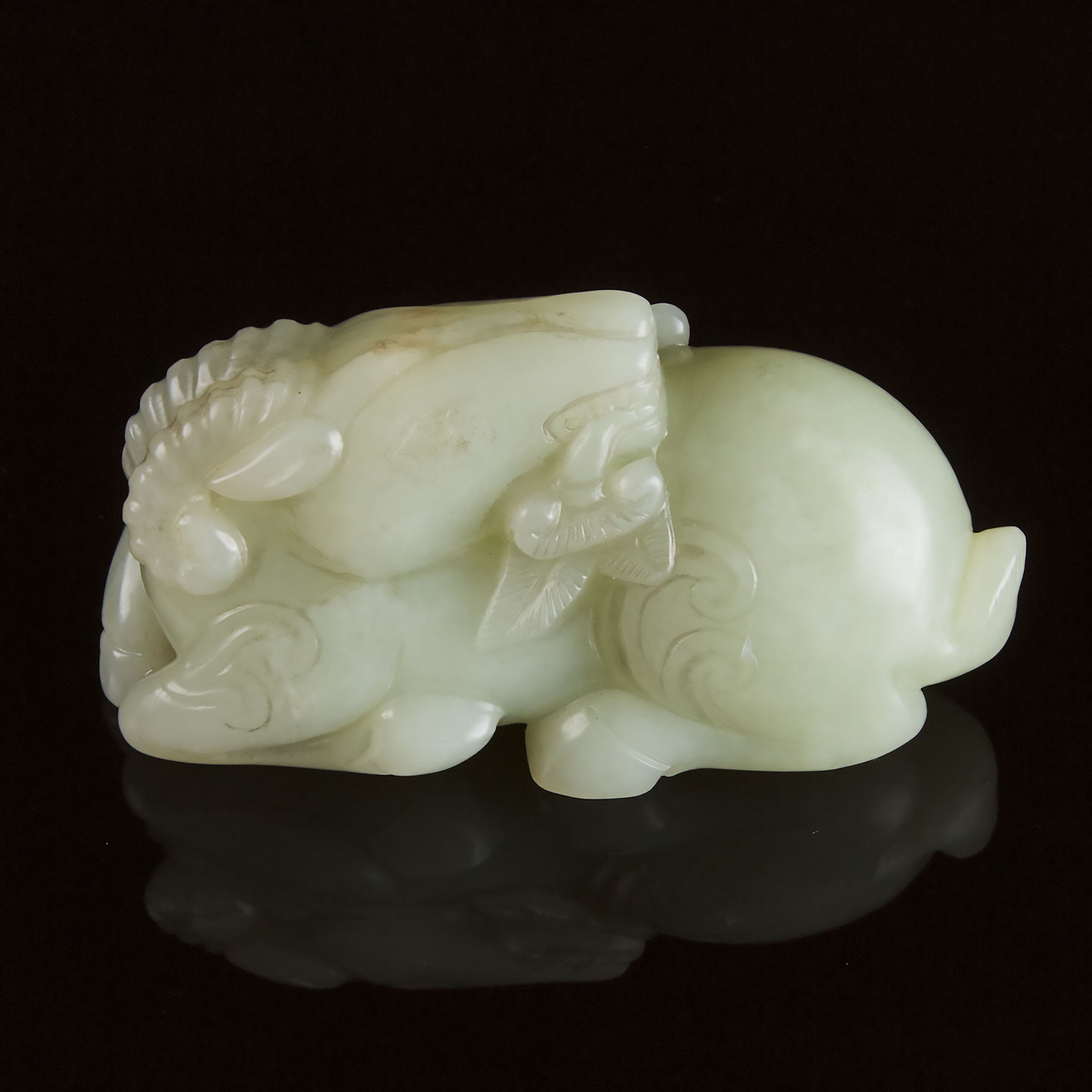 A Pale Celadon Jade Carving of a Ram