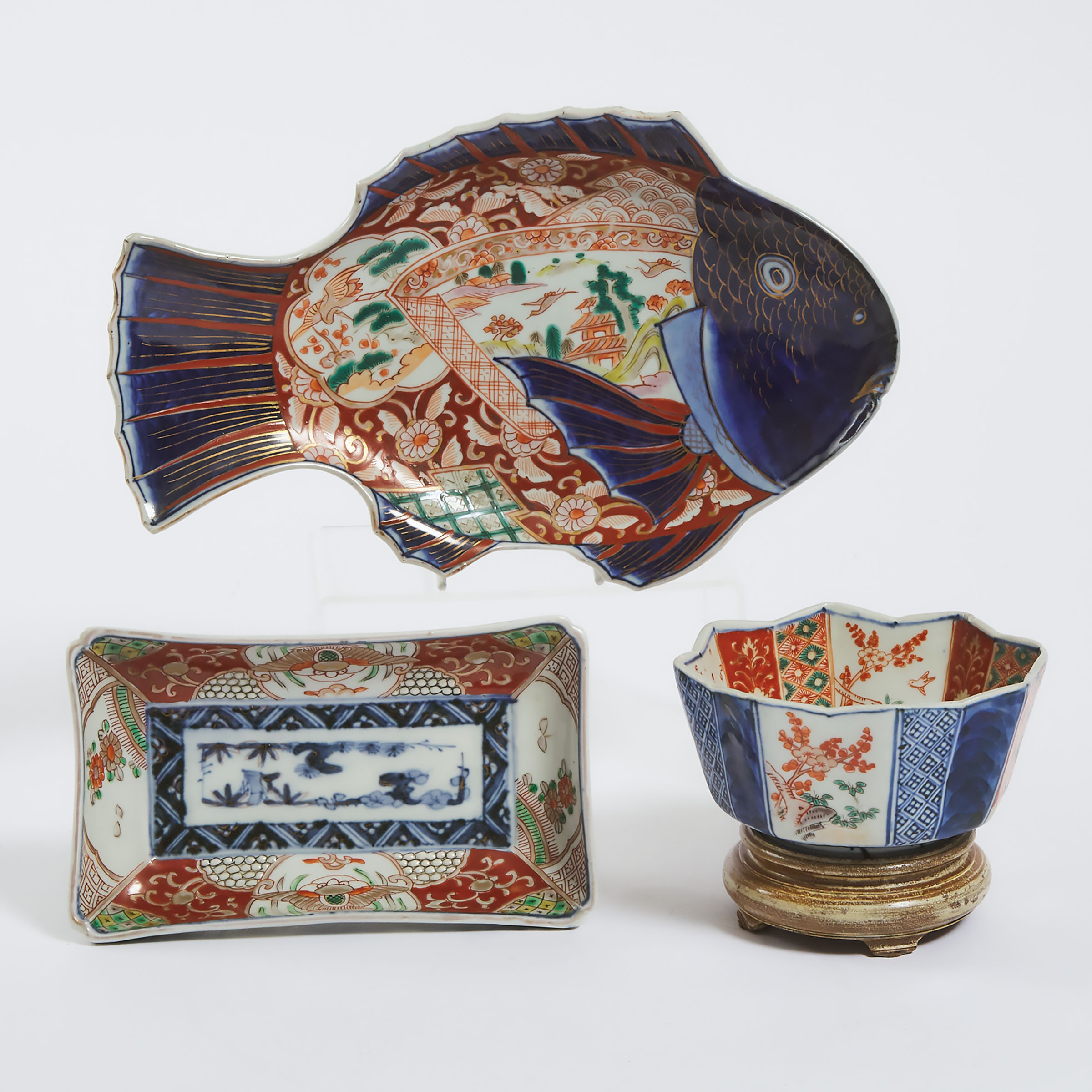 An Imari Fish-Shaped Platter, Together With an Imari Bowl and Rectangular Platter, Meiji Period, 19th Century