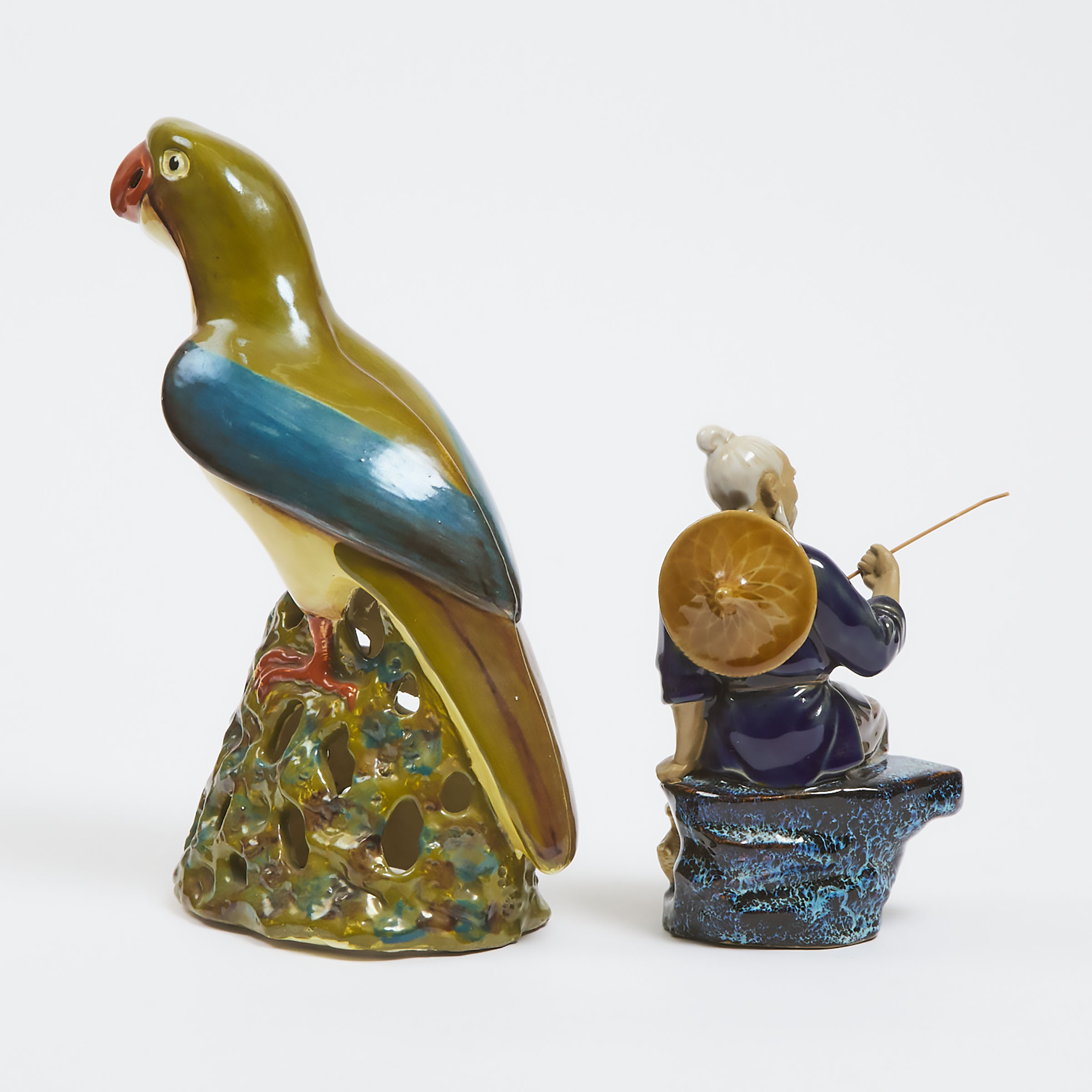 A Shiwan Pottery Figure of a Fisherman, Together With a Polychrome Glazed Parrot, Early to Mid 20th Century 