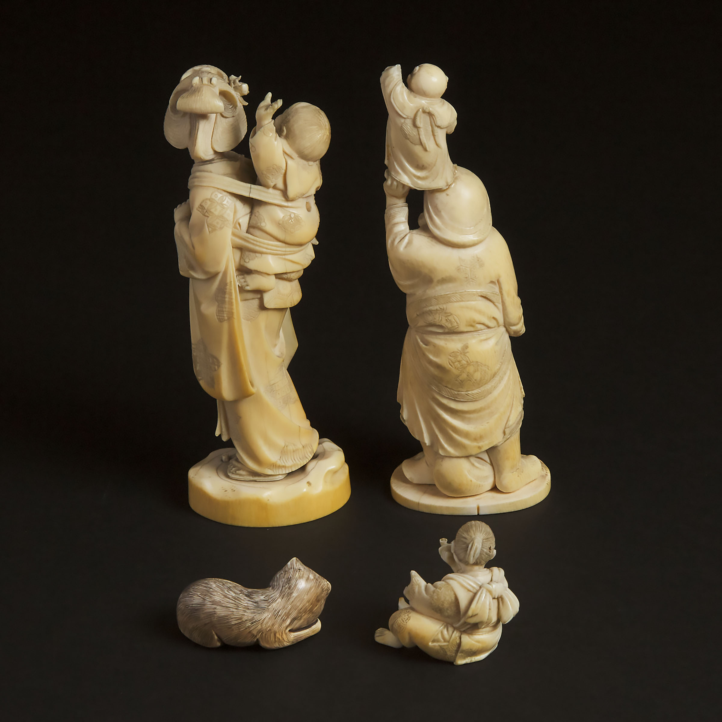 A Group of Four Japanese Ivory Carvings, Meiji Period