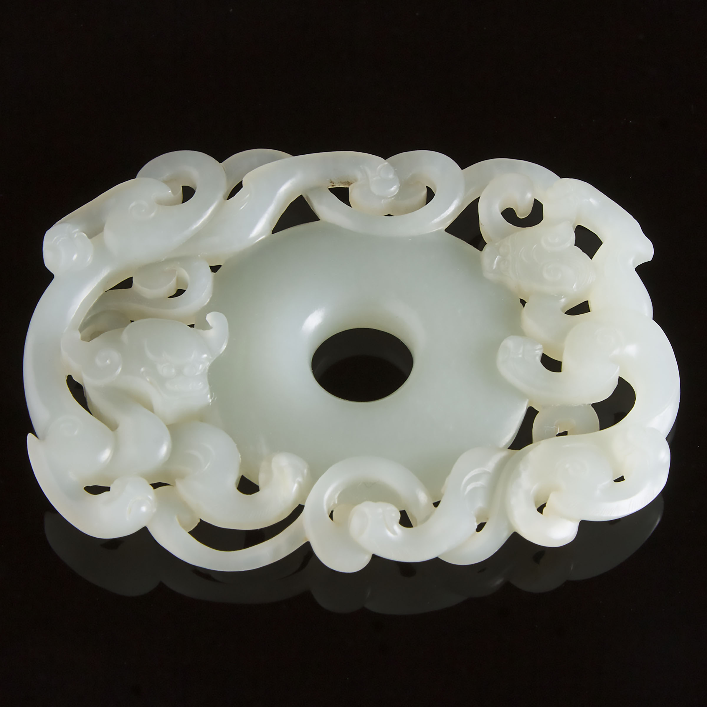 A Chinese White Jade Carved Double Chi-Dragon Pendant, 20th Century