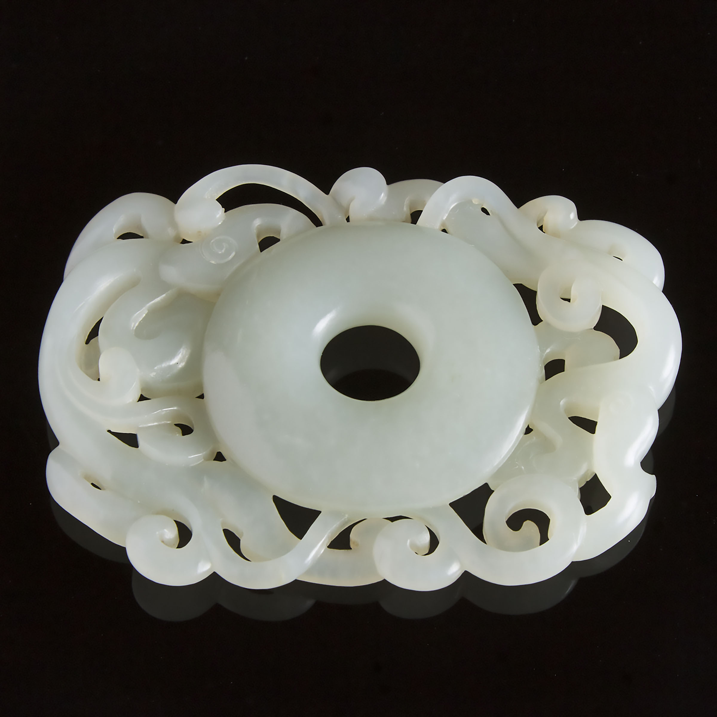 A Chinese White Jade Carved Double Chi-Dragon Pendant, 20th Century