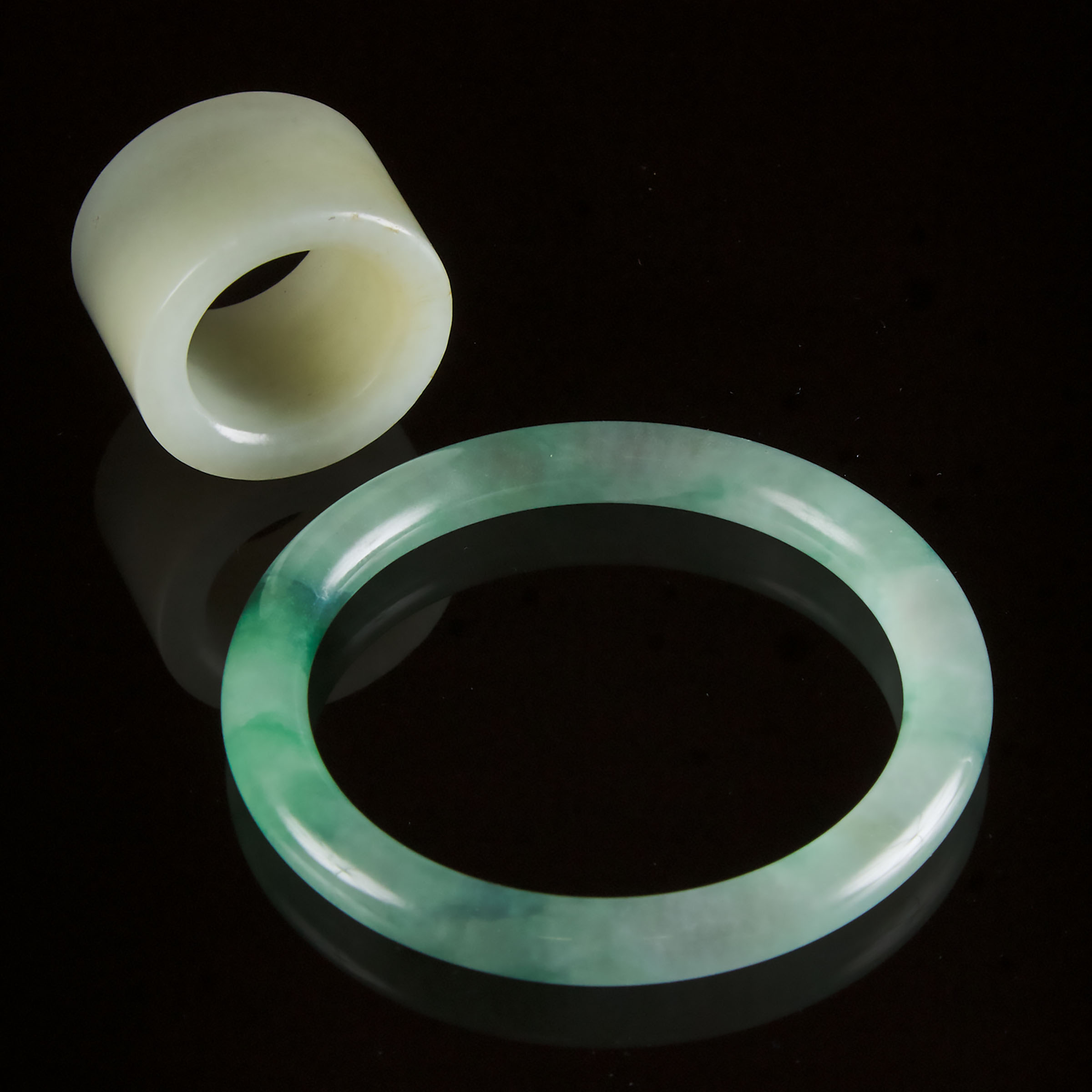A White Jade Archer's Ring, Together With a Jadeite Bangle