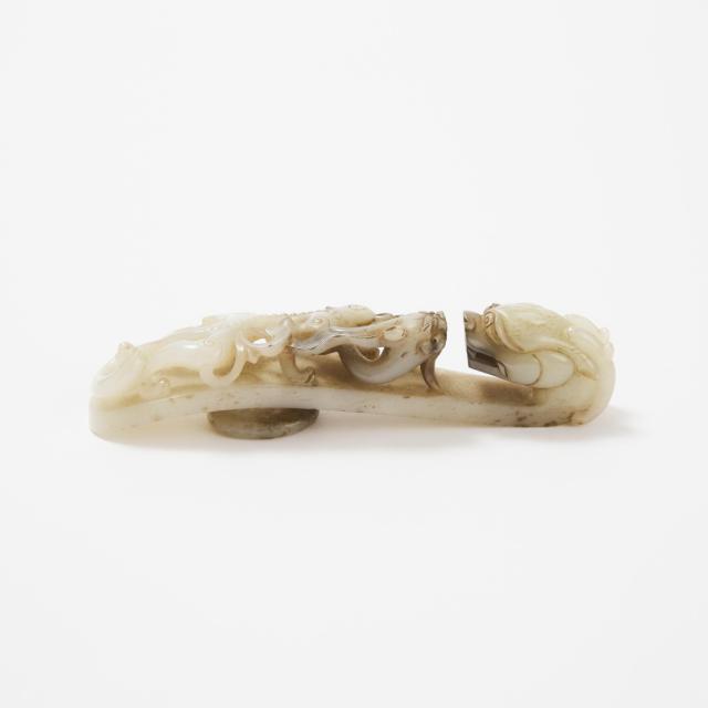 A White and Black Jade 'Dragon' Belt Hook, Late Ming/Early Qing Dynasty, 17th/18th Century