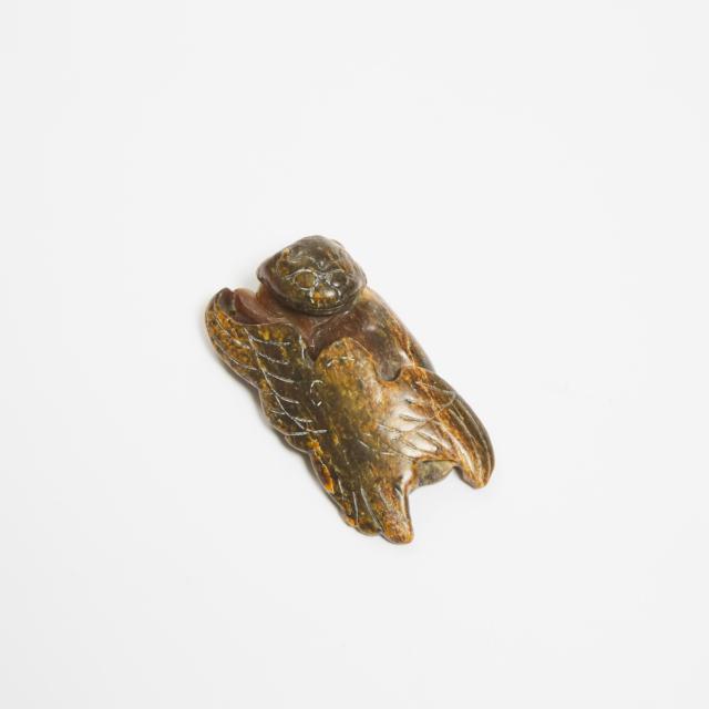 A Yellow and Russet Jade 'Bear and Eagle' Group, Ming Dynasty