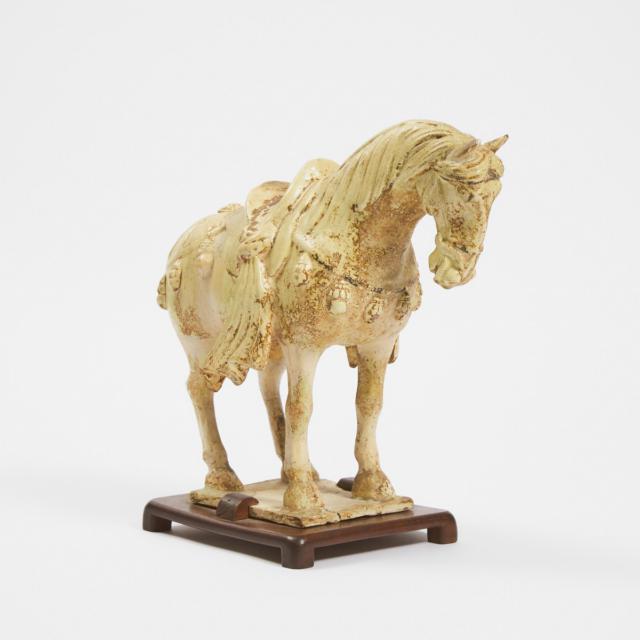 A Straw-Glazed Pottery Caparisoned Horse, Sui/Tang Dynasty