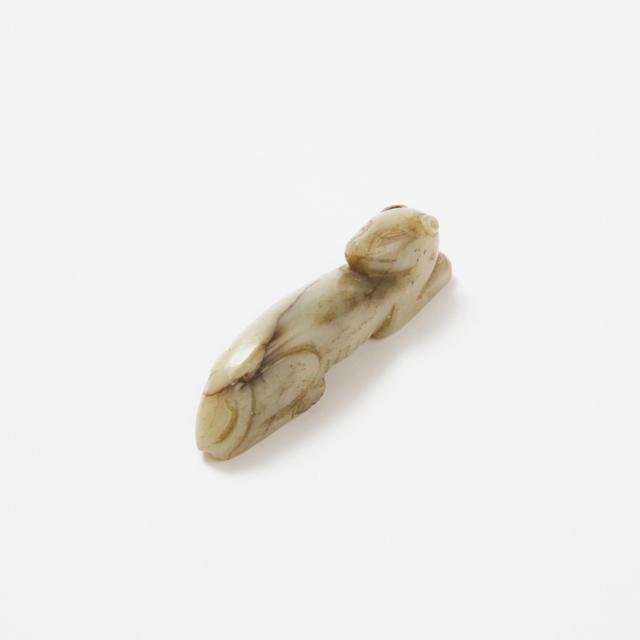 A Small Celadon and Russet Jade Recumbent Dog, Ming Dynasty, 17th/18th Century
