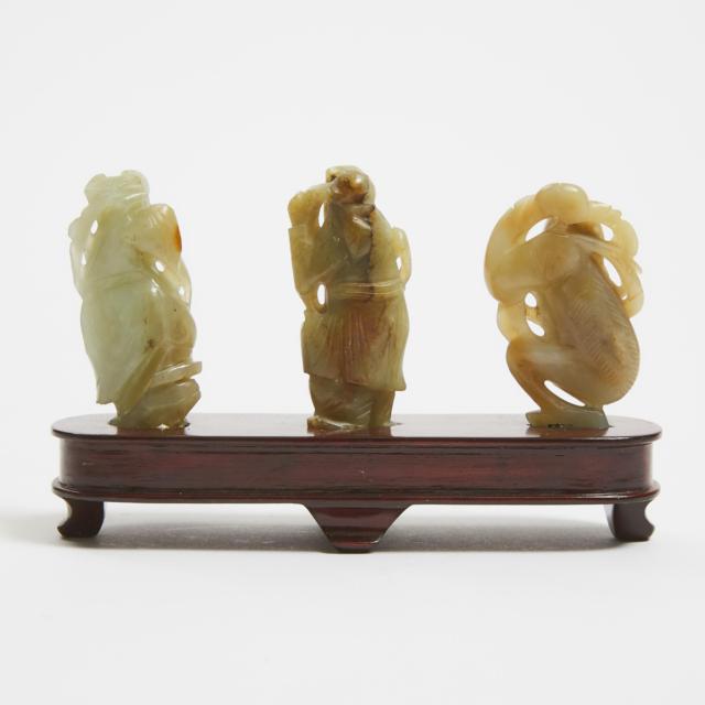 A Group of Three White and Celadon Jade Figures, 19th Century