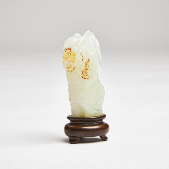 A White Jade Figure of a Boy Holding Lingzhi, Qing Dynasty