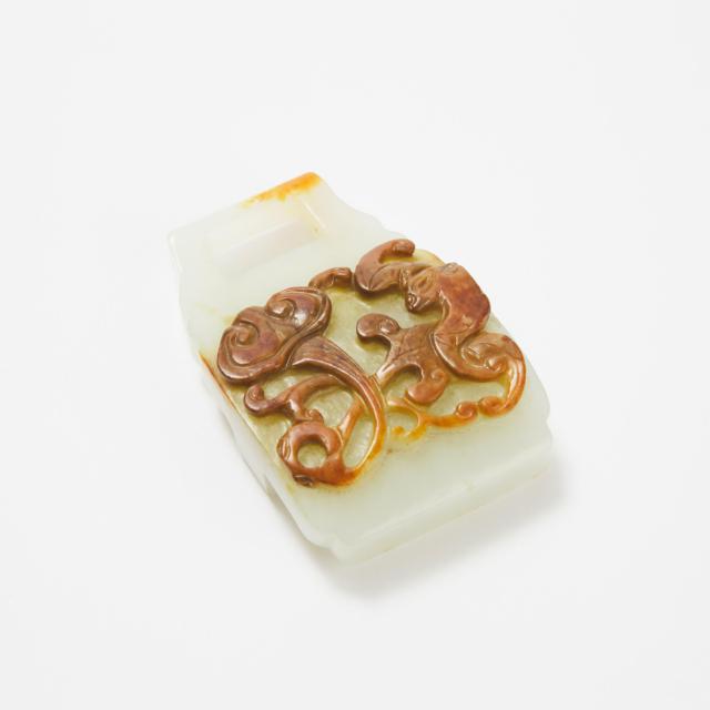 A Carved and Pierced White and Russet Jade Belt Buckle, 18th Century