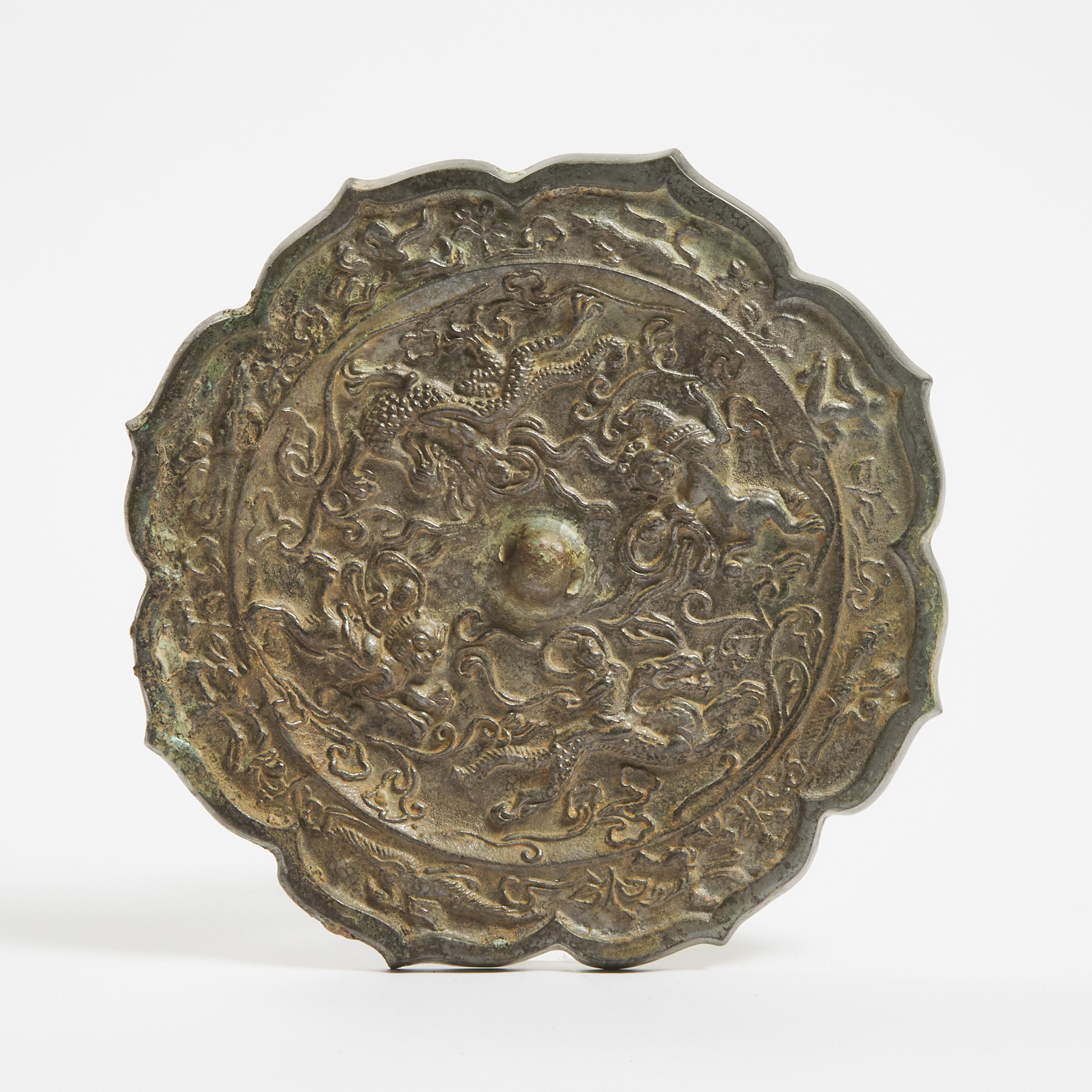 A Bronze Lobed Octagonal Mirror, Tang Dynasty (AD 618-907)