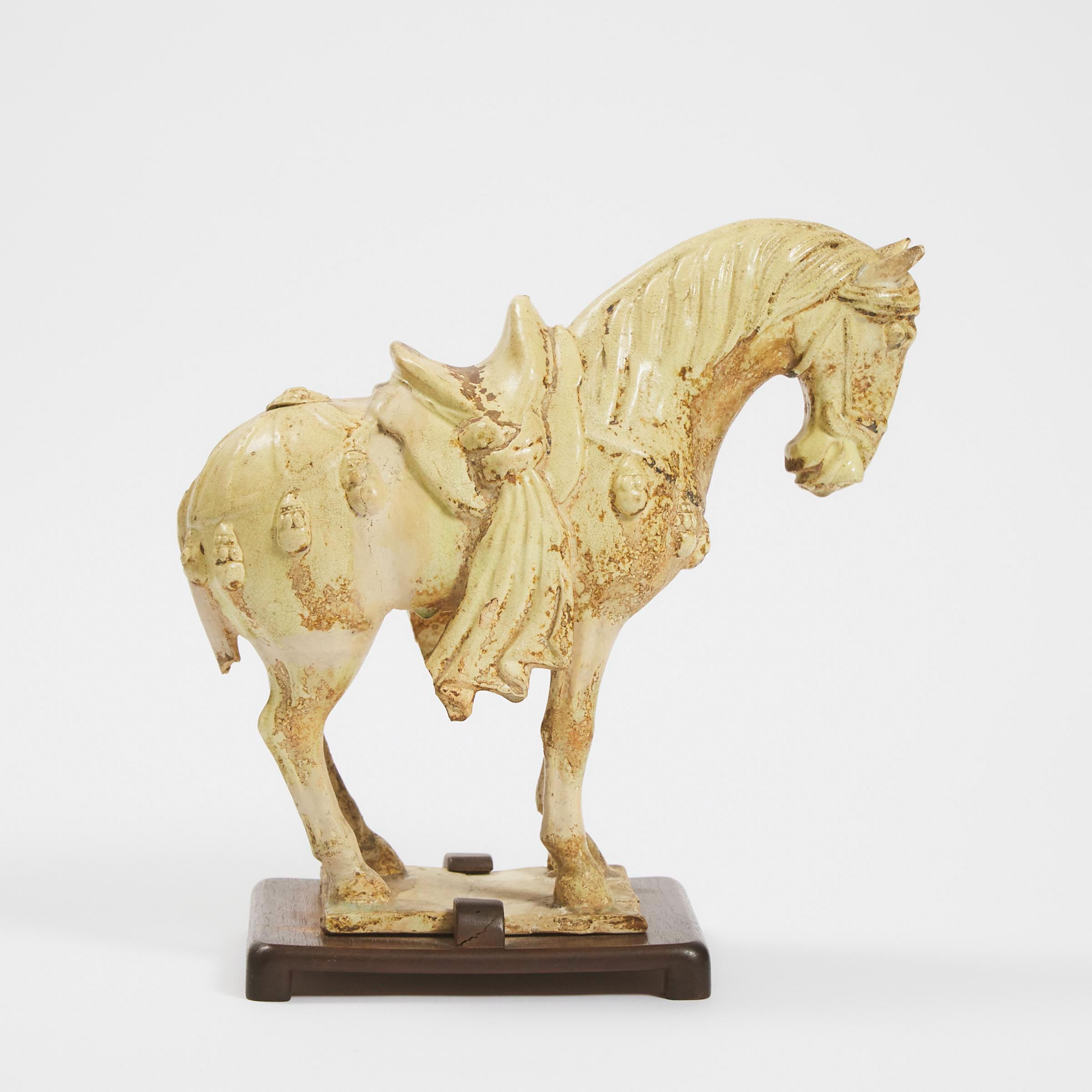 A Straw-Glazed Pottery Caparisoned Horse, Sui/Tang Dynasty