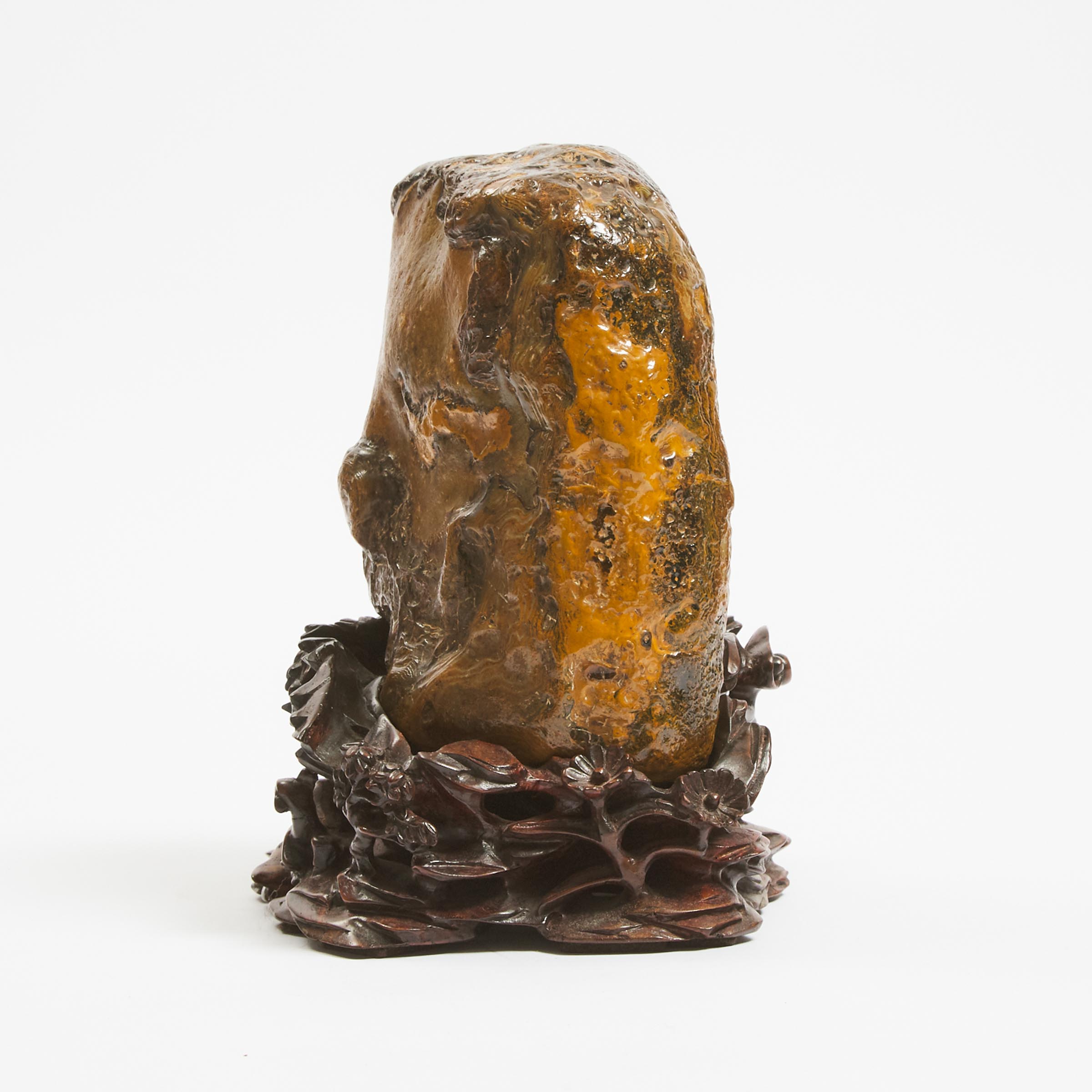 A Chinese Agate Scholar's Rock on a Carved Hardwood Stand 