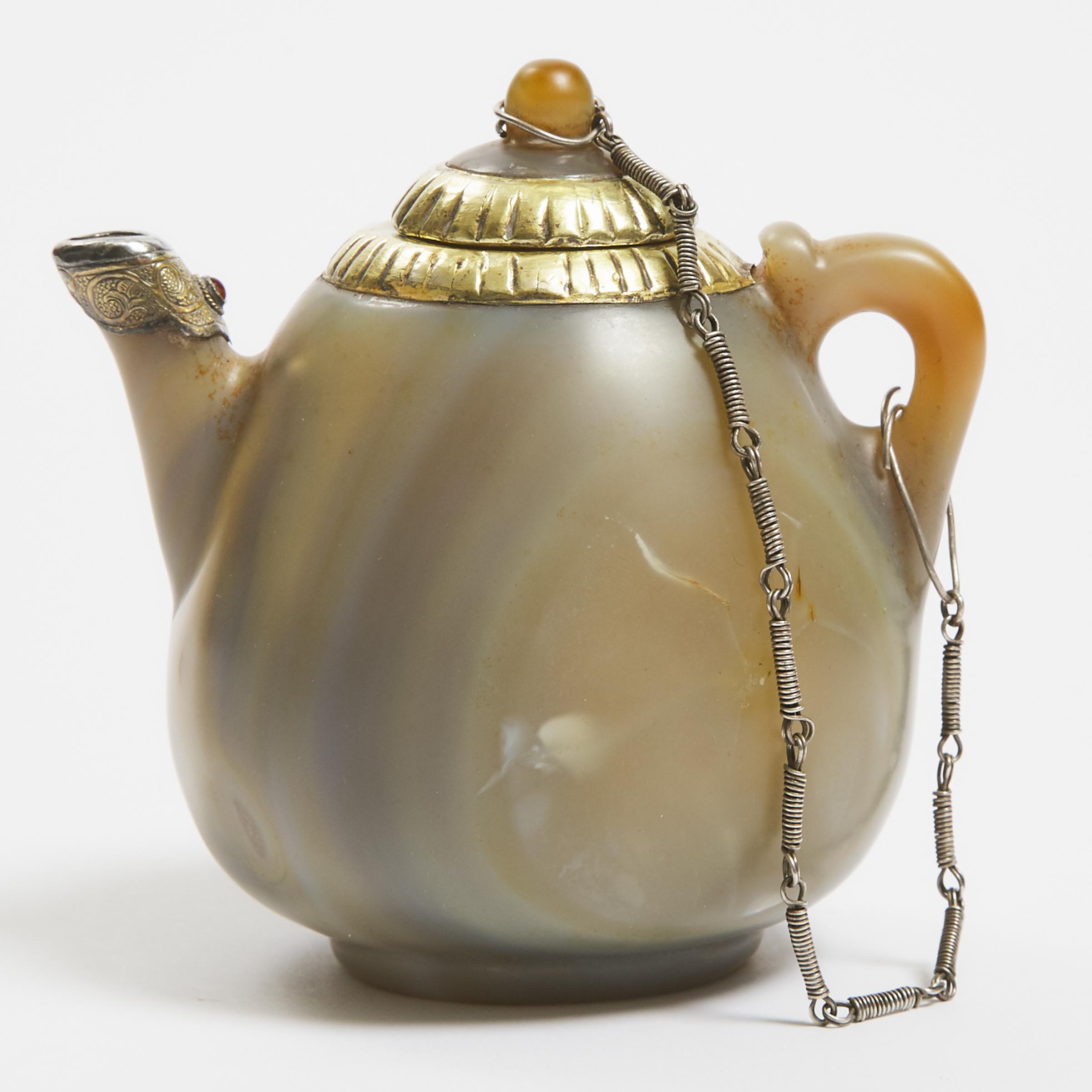 A Liao-Style Silver and Gold Mounted Agate Teapot and Cover