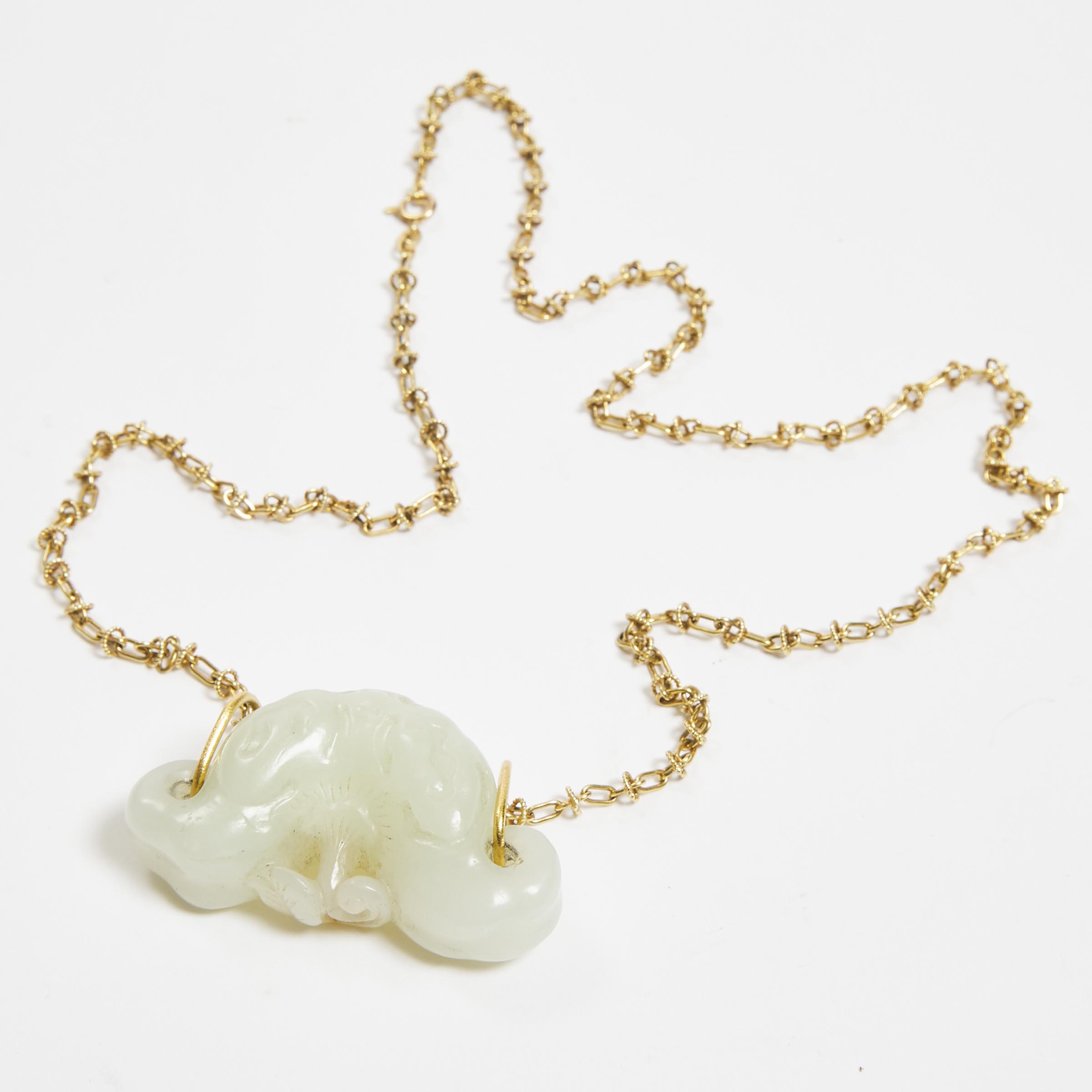 A White Jade Carving of a Water Caltrop, Qing Dynasty, 18th/19th Century