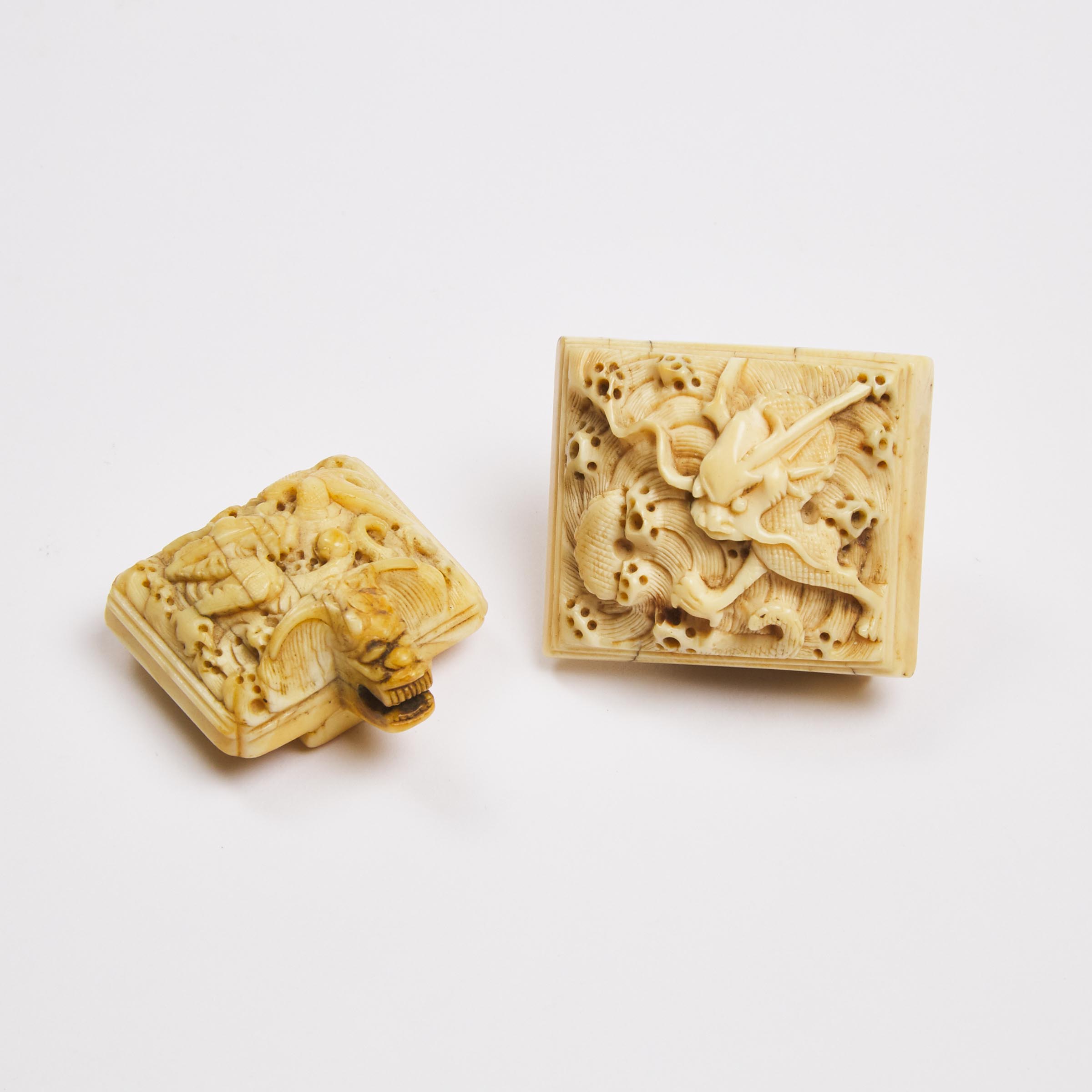 Two Chinese Carved Ivory Belt Buckles, 18th Century