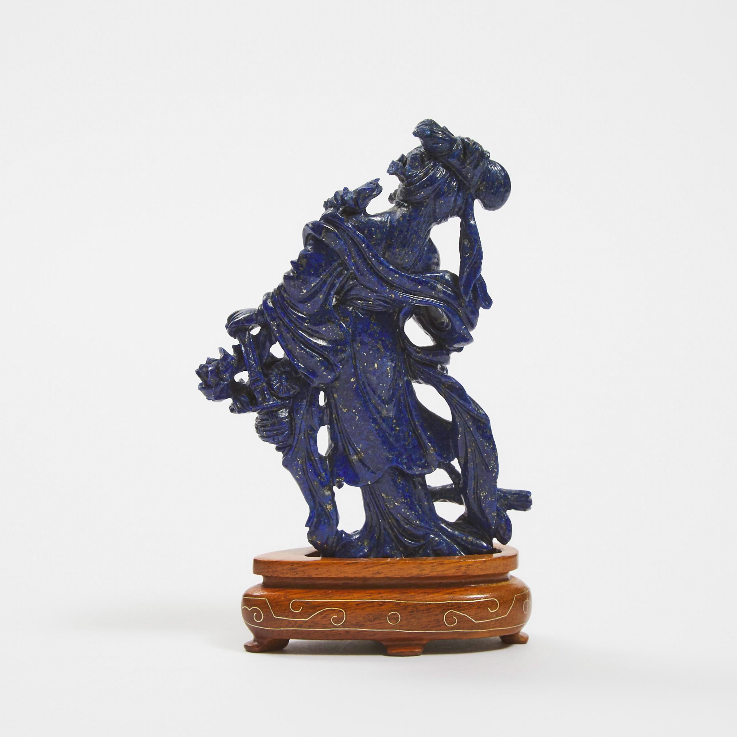 A Chinese Lapis Lazuli Carving of a Female Immortal, Early-Mid 20th Century