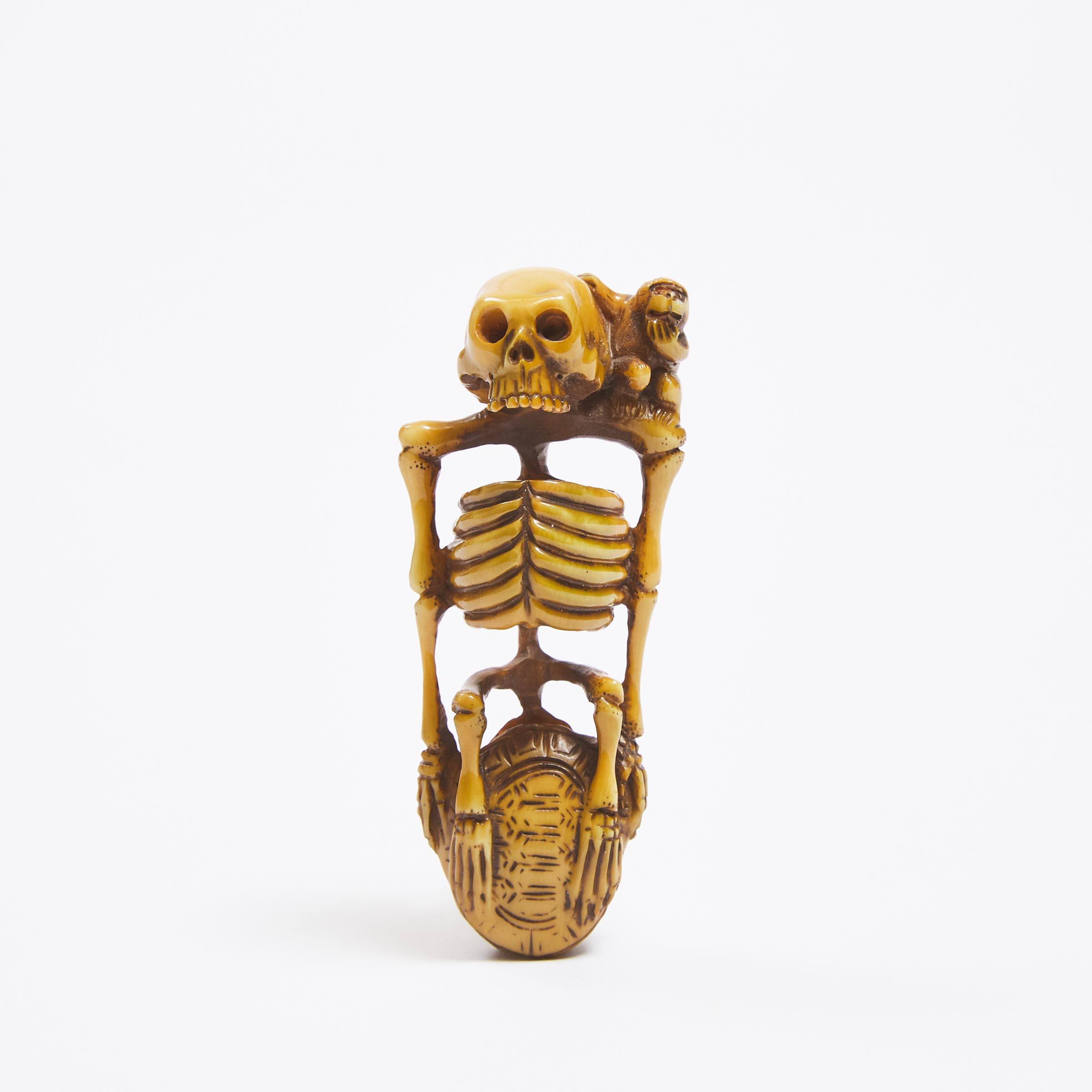 An Ivory Netsuke of a Skeleton, Signed Yoshikawa/Kichigawa, Mid 19th Century