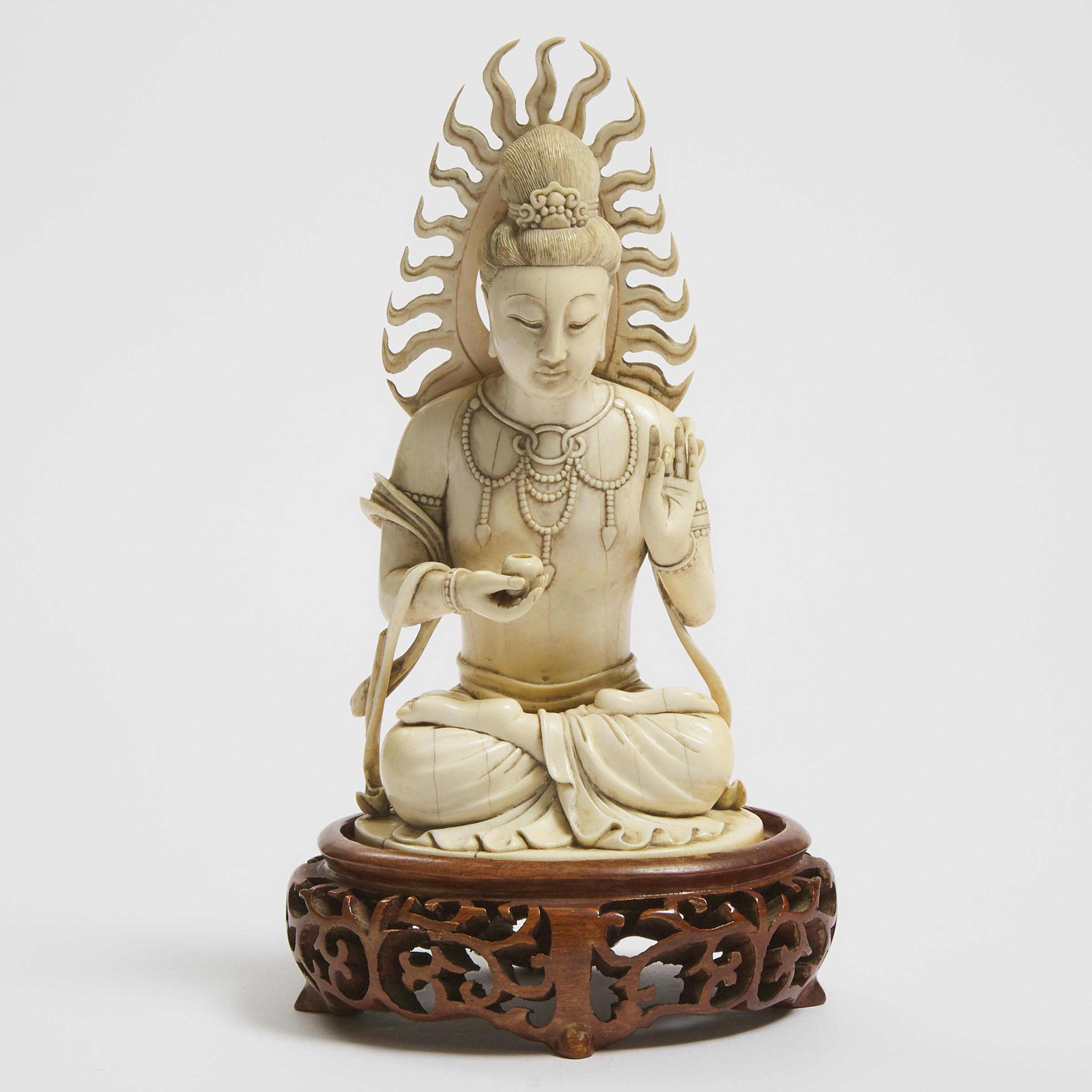 An Ivory Figure of a Seated Bodhisattva, Late 19th Century