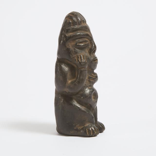 West African Terra Cotta Seated Figure, 20th century