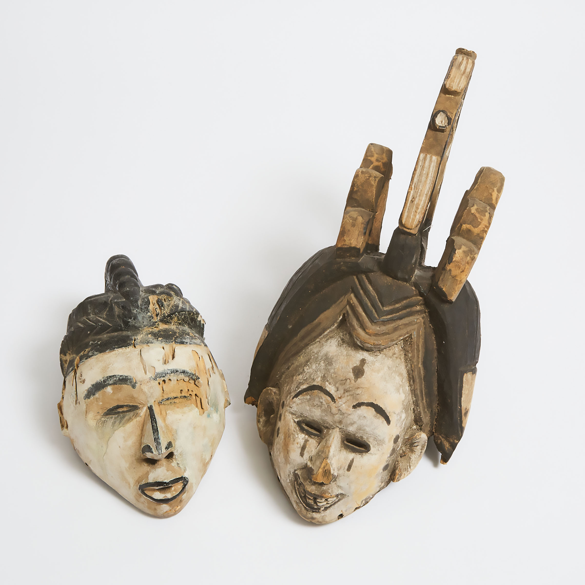 Two Igbo Helmet Masks, West Africa, early to mid 20th century