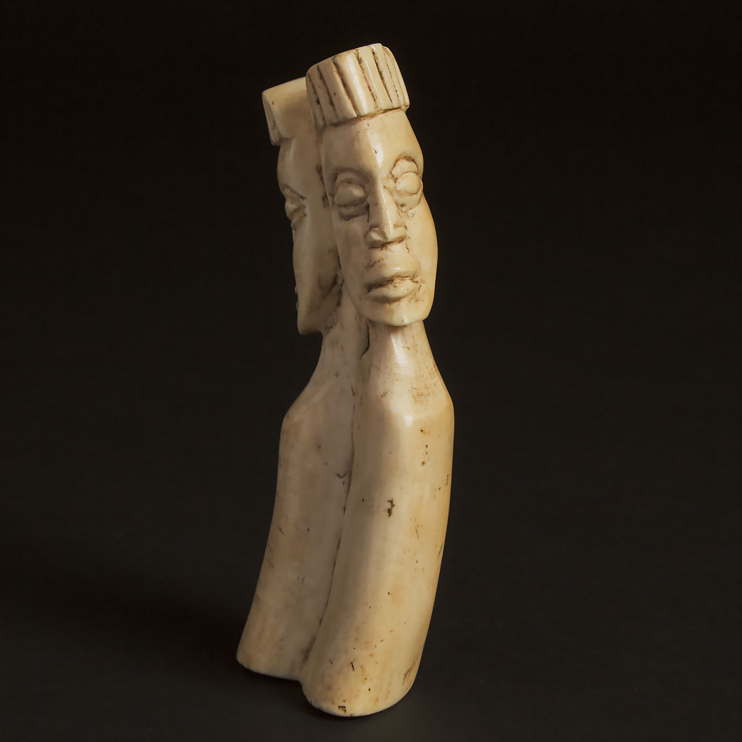 African Janus Head Carved Hippo Tooth, 20th century