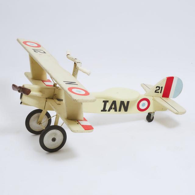 Group of Three Metal and Painted Wood Toy Airplane Riding Toys, early-mid 20th century