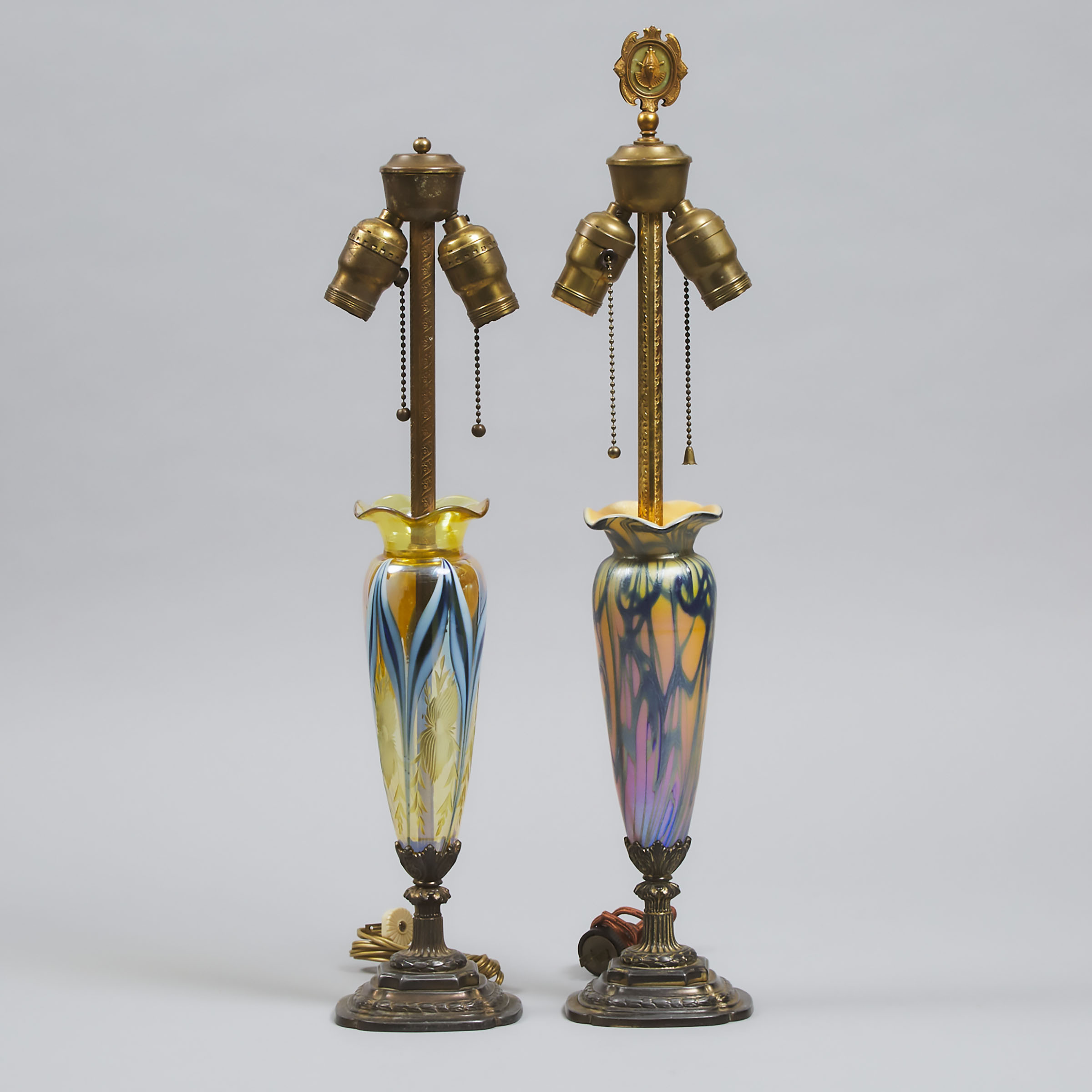 Near Pair of American Art Glass and Gilt Metal Table Lamps, probably Quezal or Durand, early 20th century