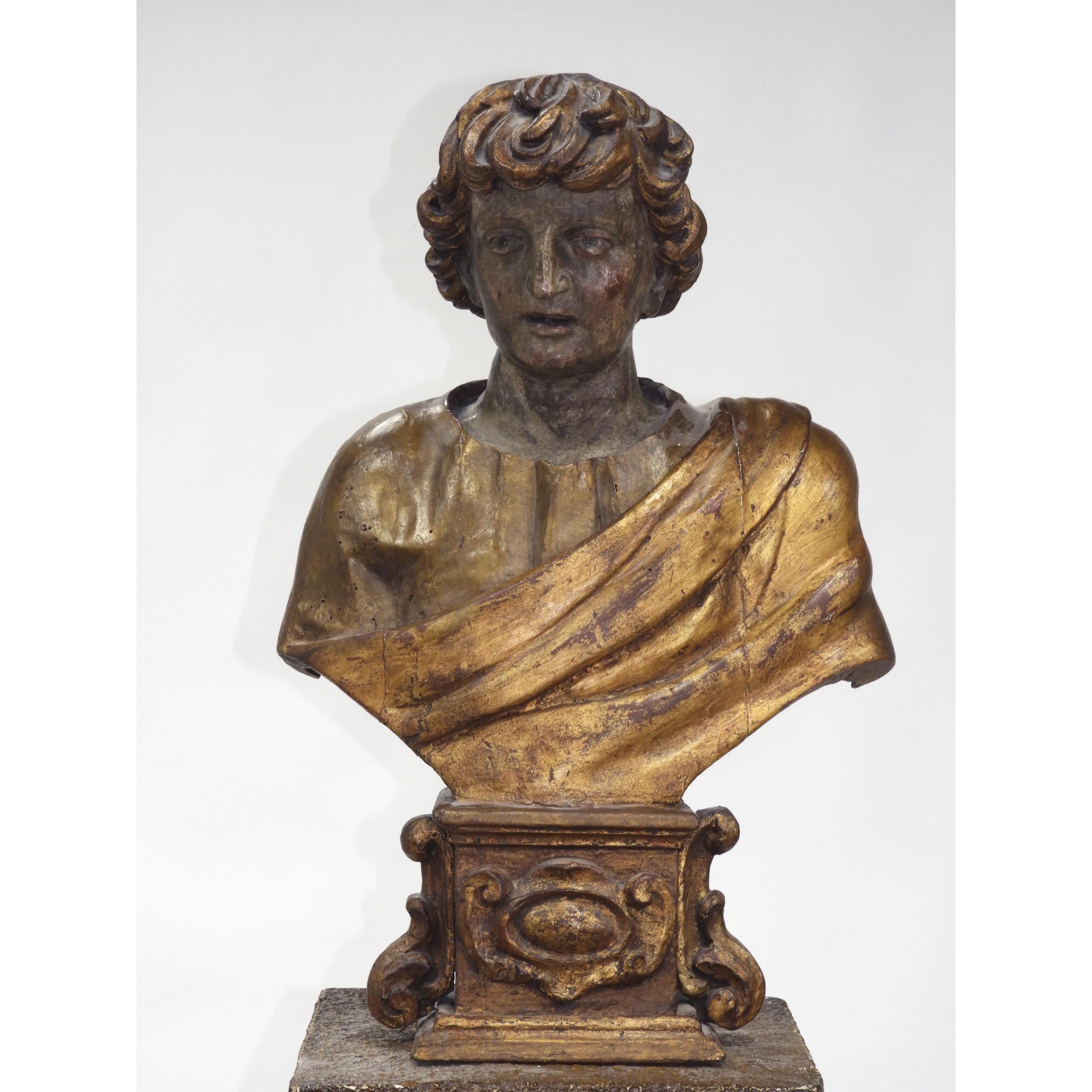 Italian Parcel Gilt and Painted Wood Reliquary Bust of a Saint., 18th century