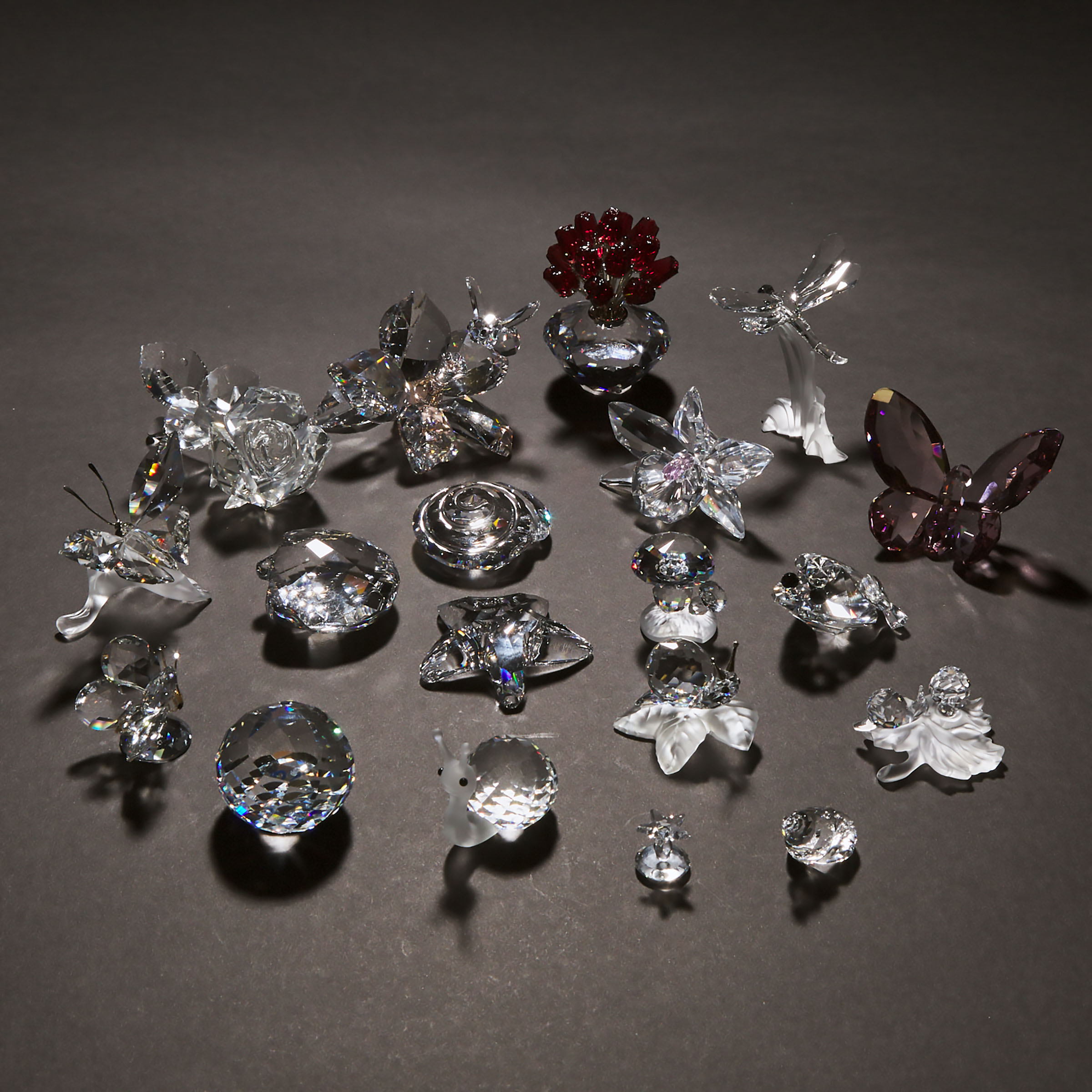 Group of Nineteen Swarovski Crystal Flowers, Shells, Insects, and Other Decorative Objects, late 20th/early 21st century