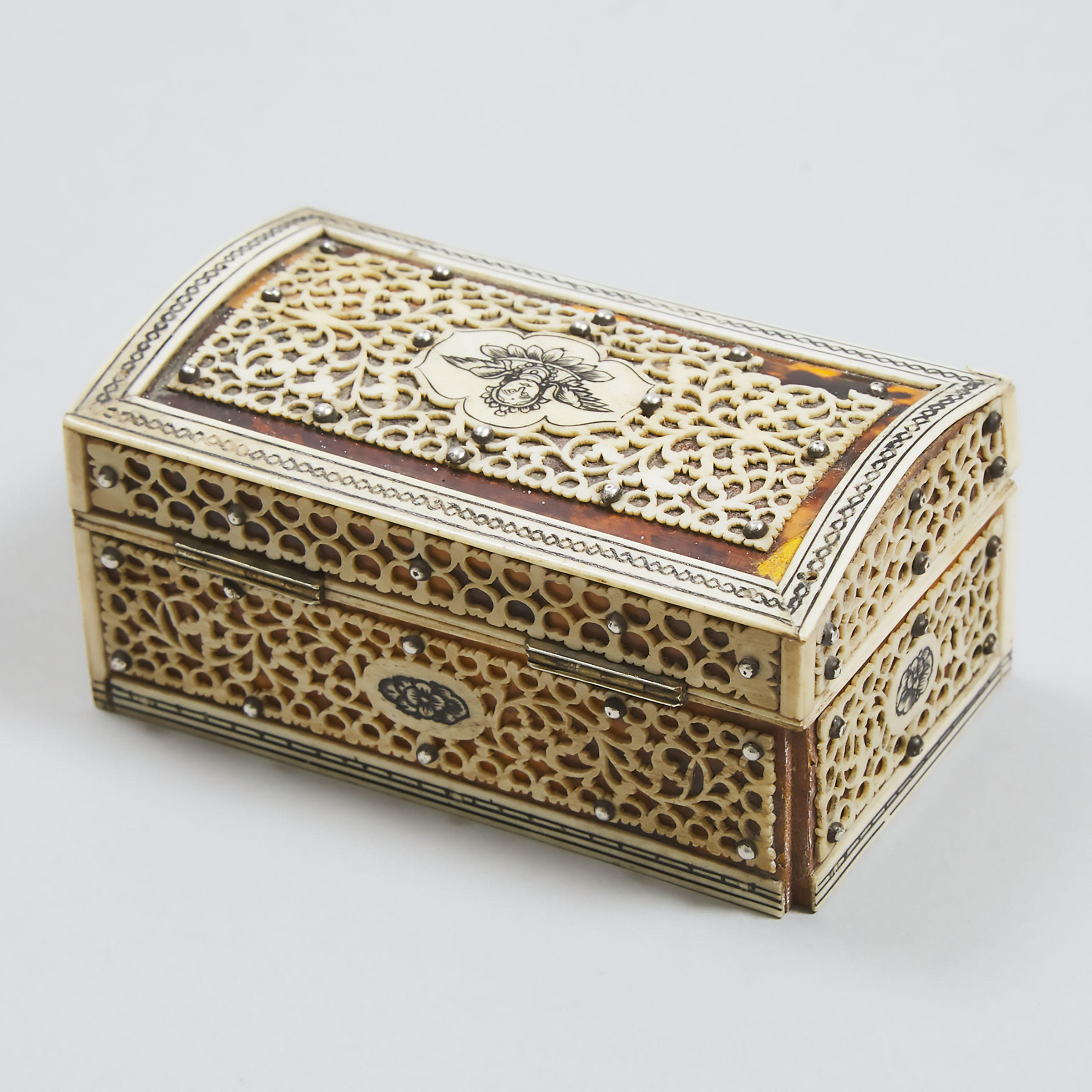Vizagapatam Silver Studded Ivory Fretwork Overlaid Tortoiseshell Veneered Box, early 20th century