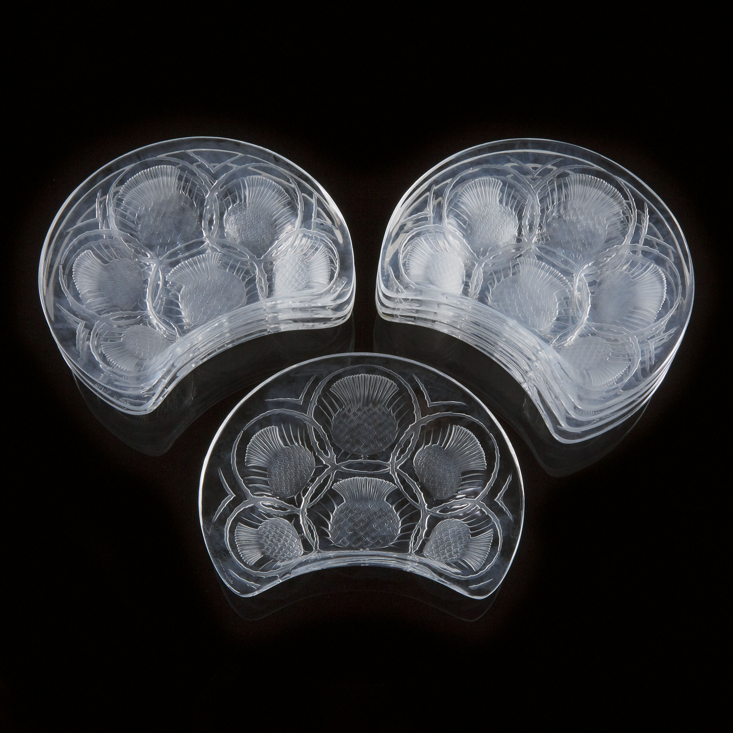 'Chardons', Set of Eight Lalique Moulded and Partly Frosted Glass Crescent Shaped Plates, post-1945