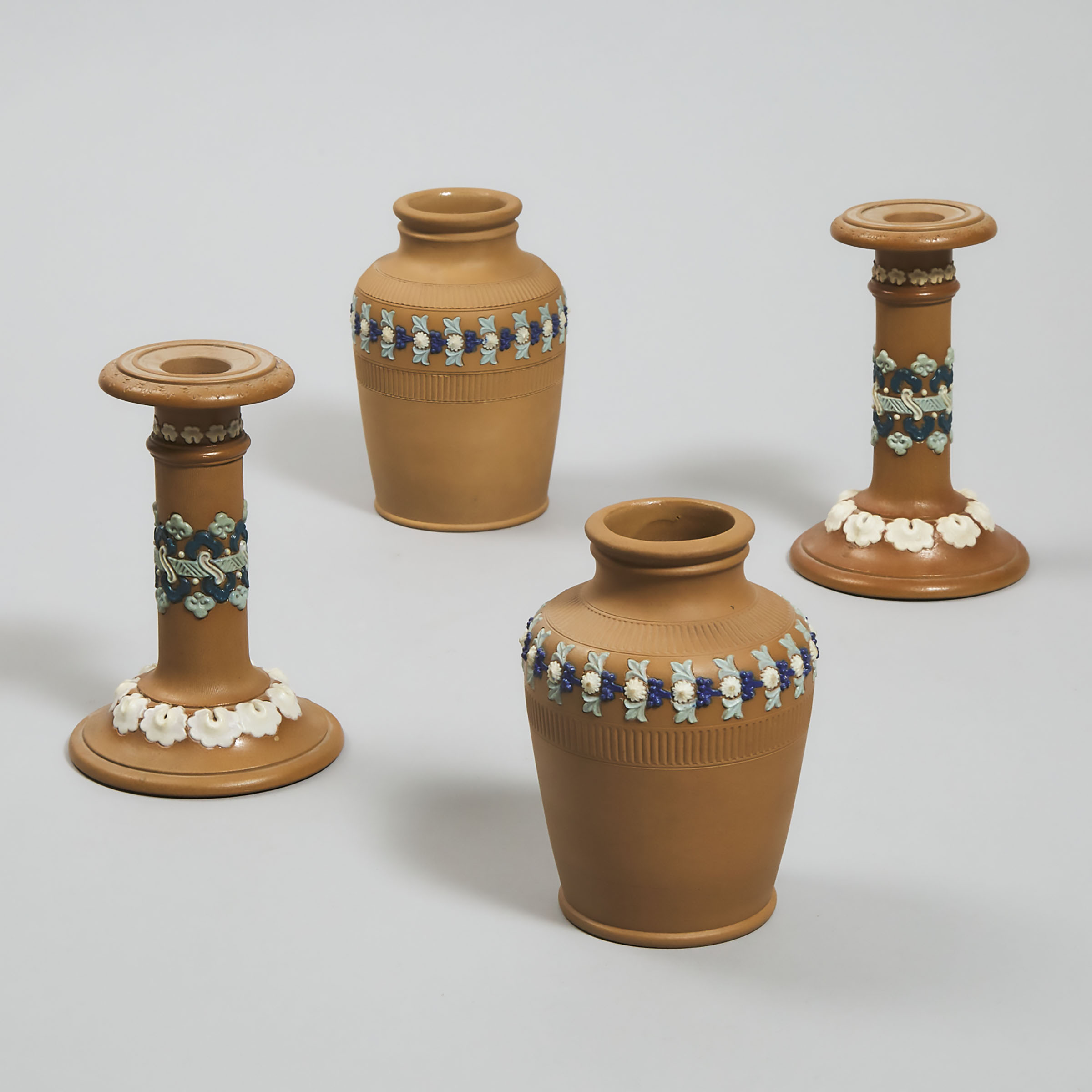 Pair of Doulton Lambeth Silicon Candlesticks and a Pair of Vases, late 19th century