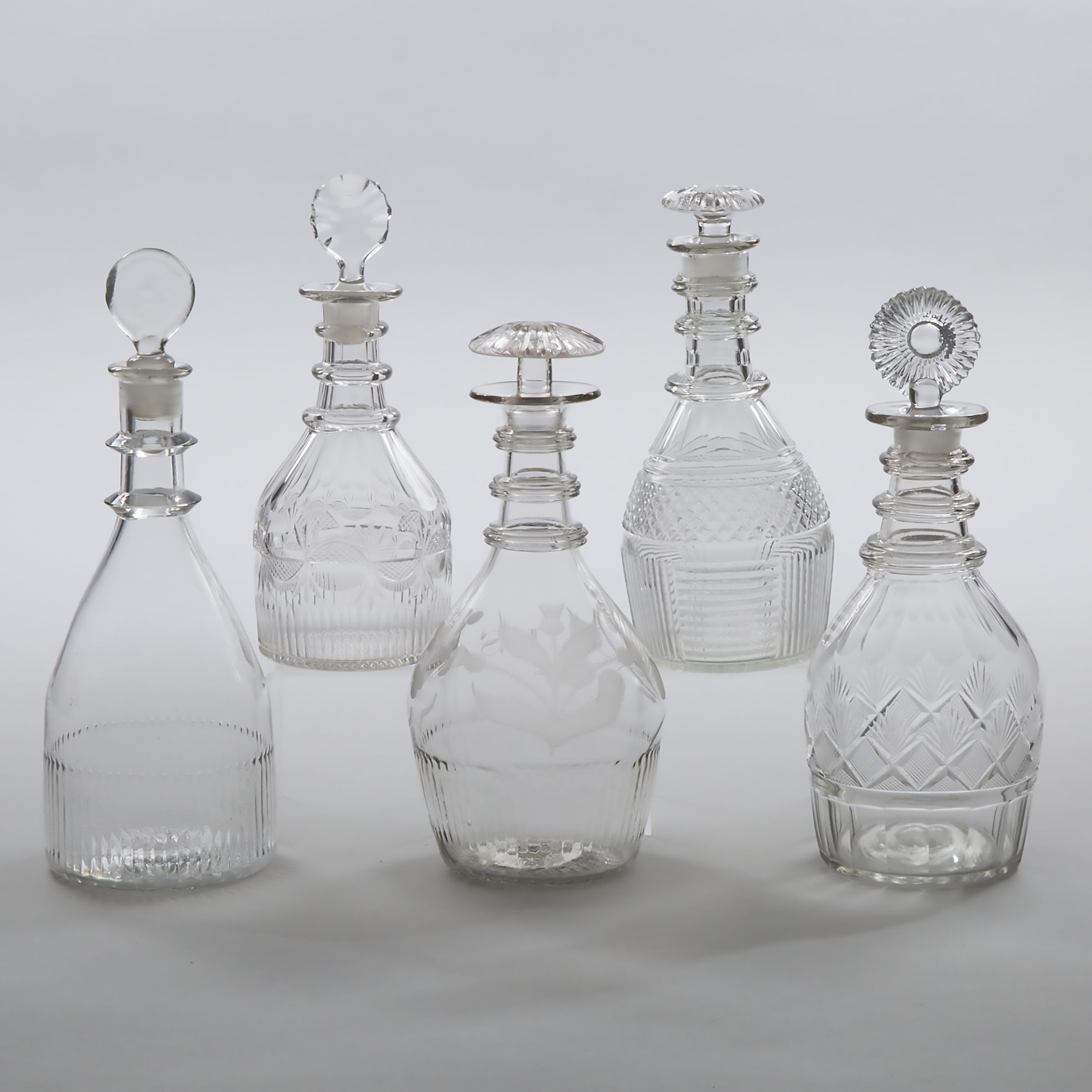 Five English Cut Glass Decanters, 19th century