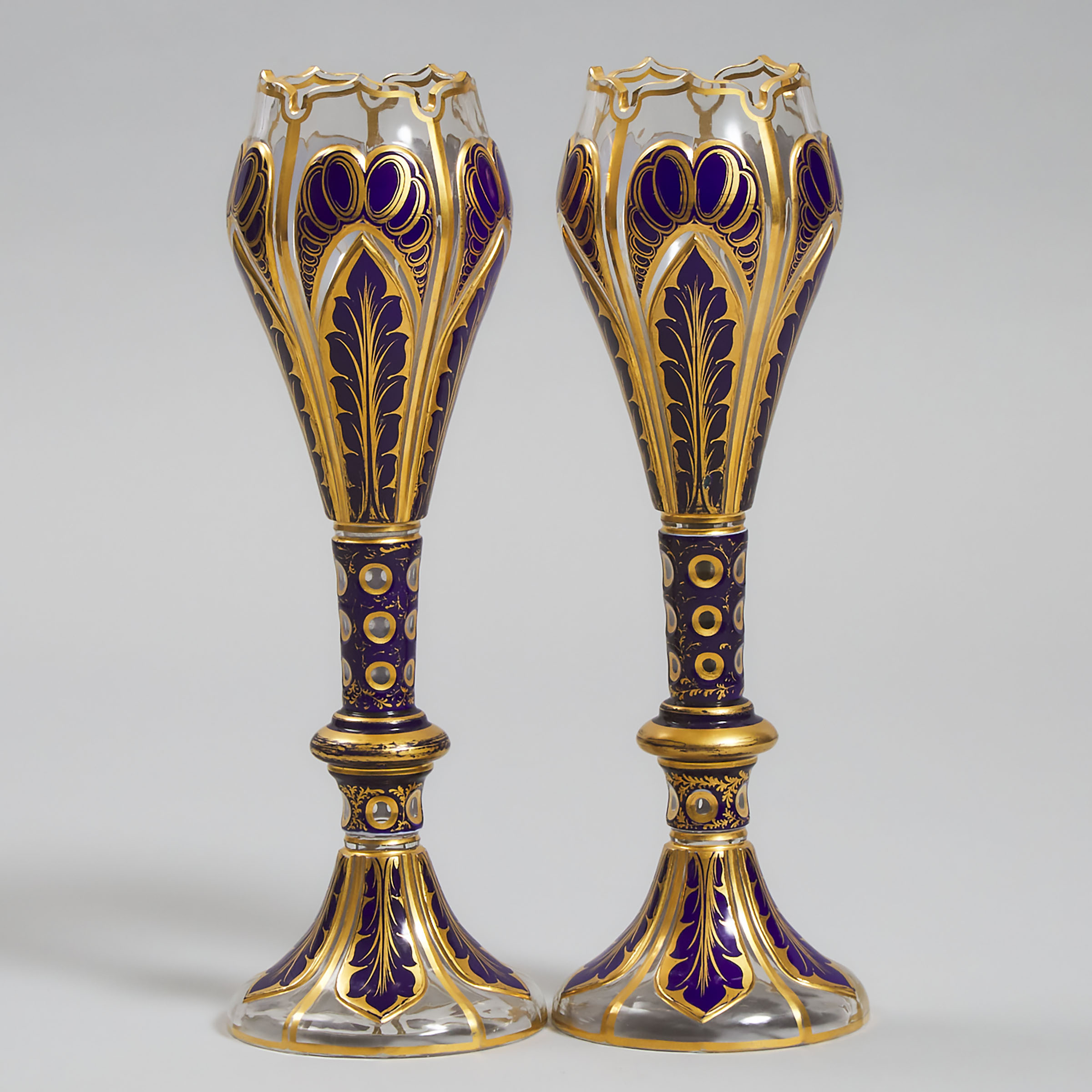 Pair of Bohemian Blue Overlaid, Cut and Gilt Glass Vases, late 19th century