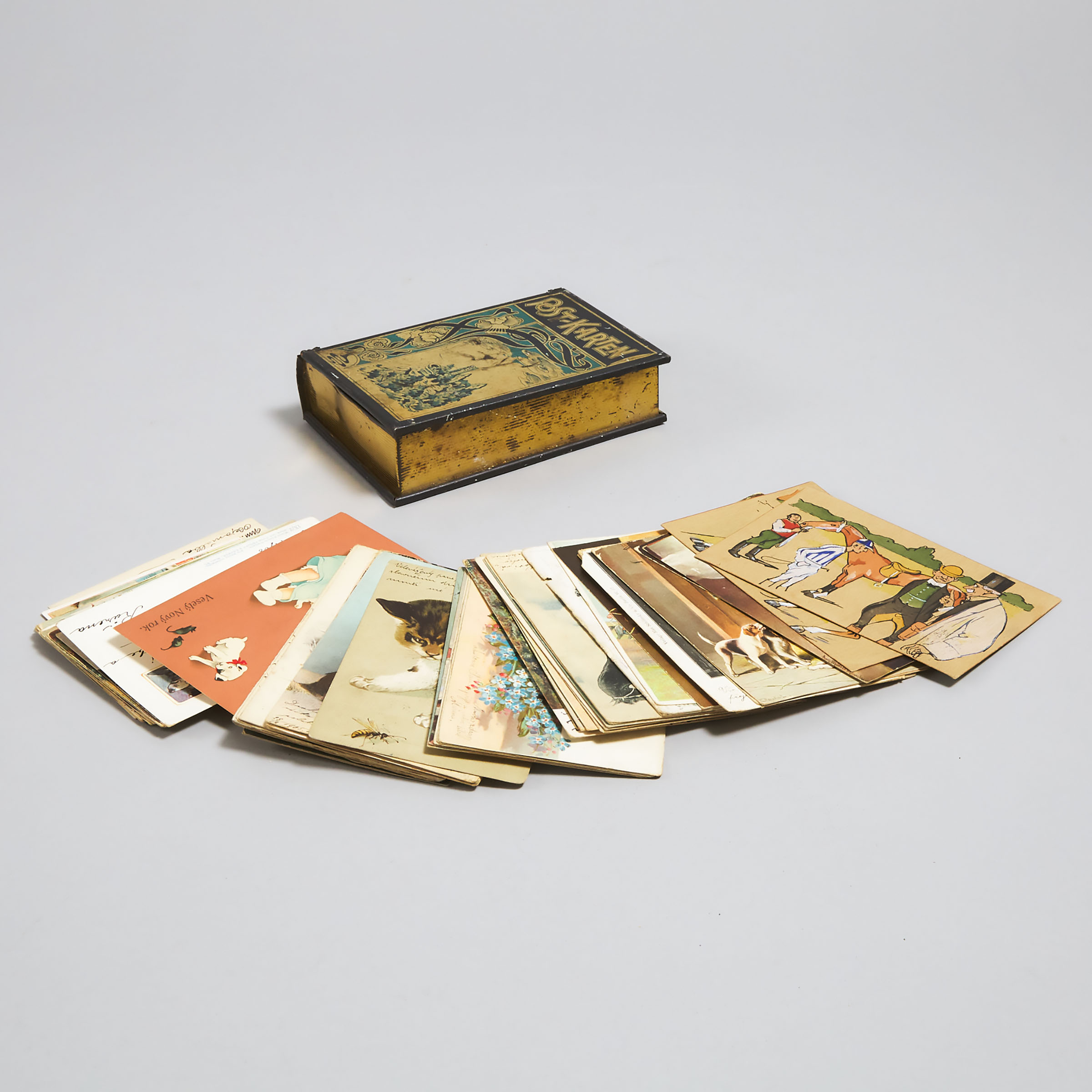 Approximately 70 Bohemian Postcards in a Tin Book-Form Box, c.1905