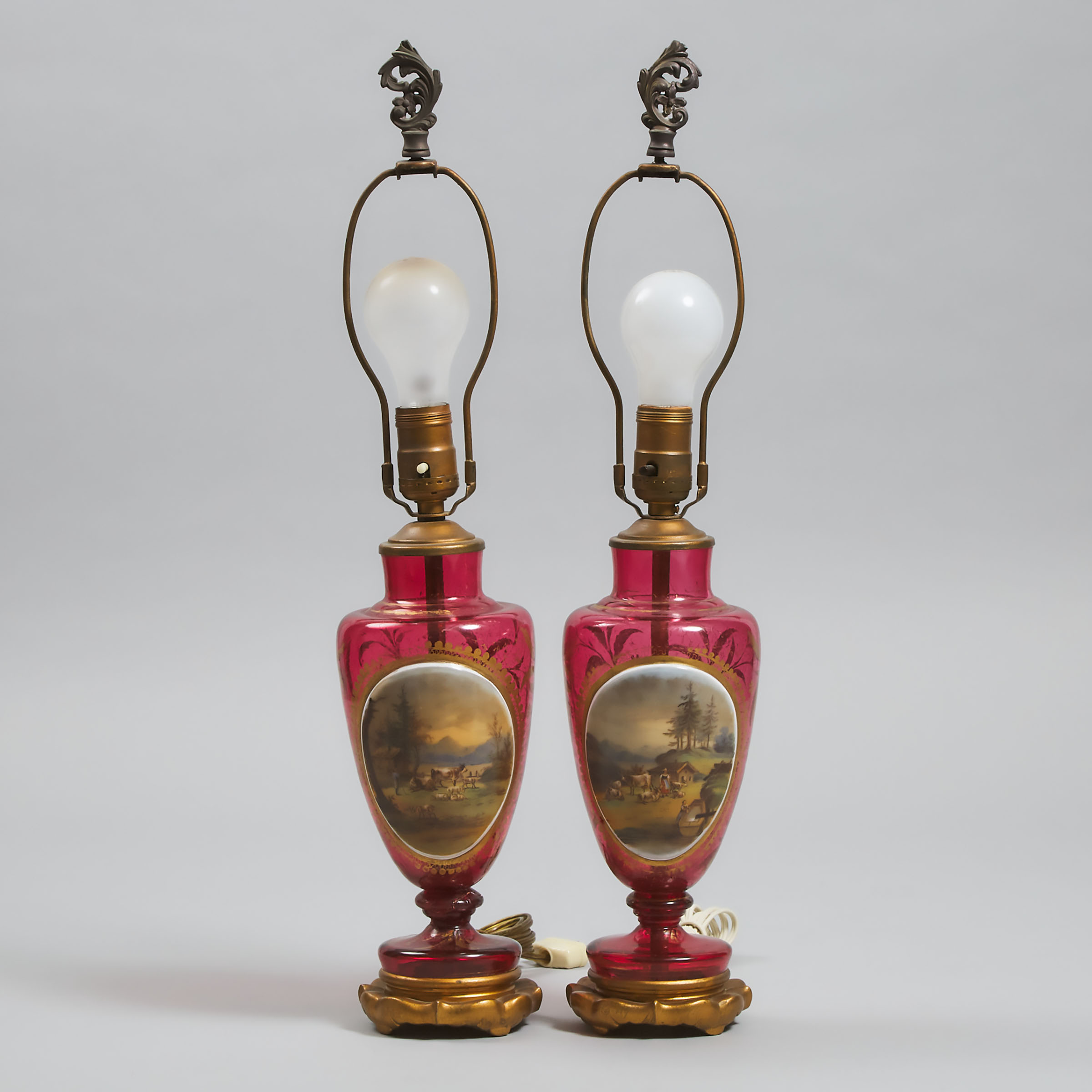 Pair of Bohemian Overlaid, Enameled and Gilt Red Glass Vases as Table Lamps, late 19th century