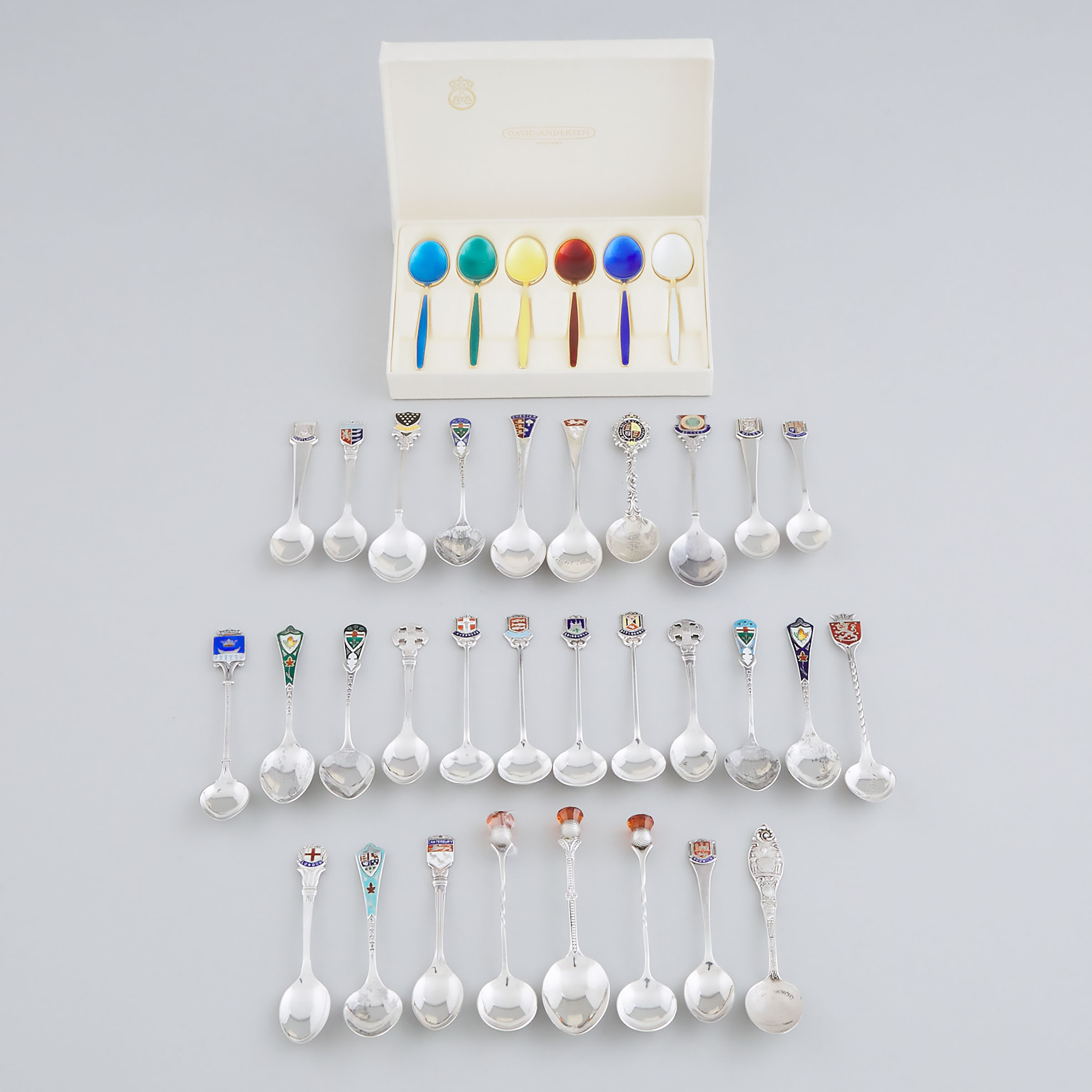 Thirty Mainly North American and English Silver Souvenir Spoons and Six Norwegian Enameled Silver-Gilt Coffee Spoons, 20th century
