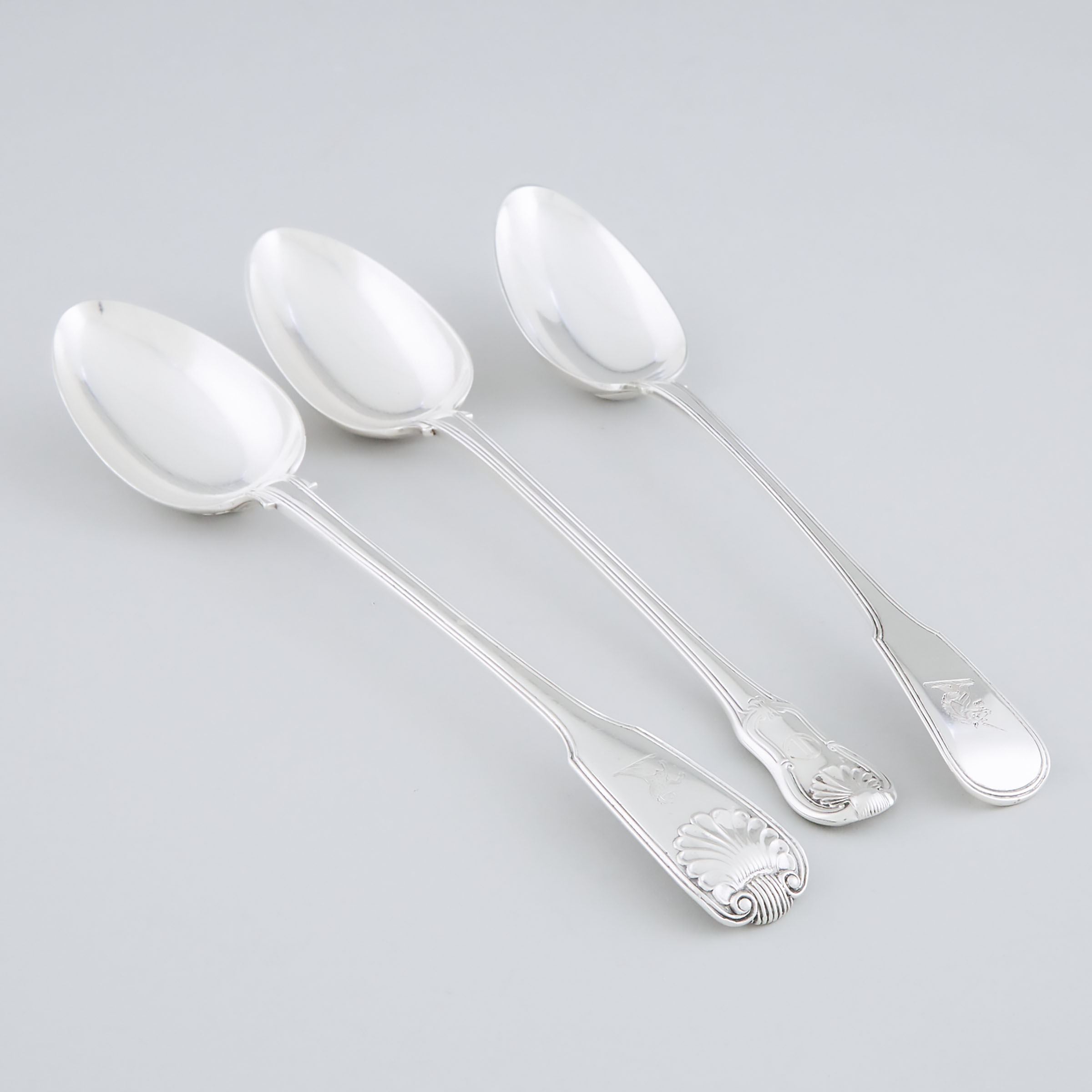 Three George III and Victorian Silver Serving Spoons, London, 1807/1811/1857